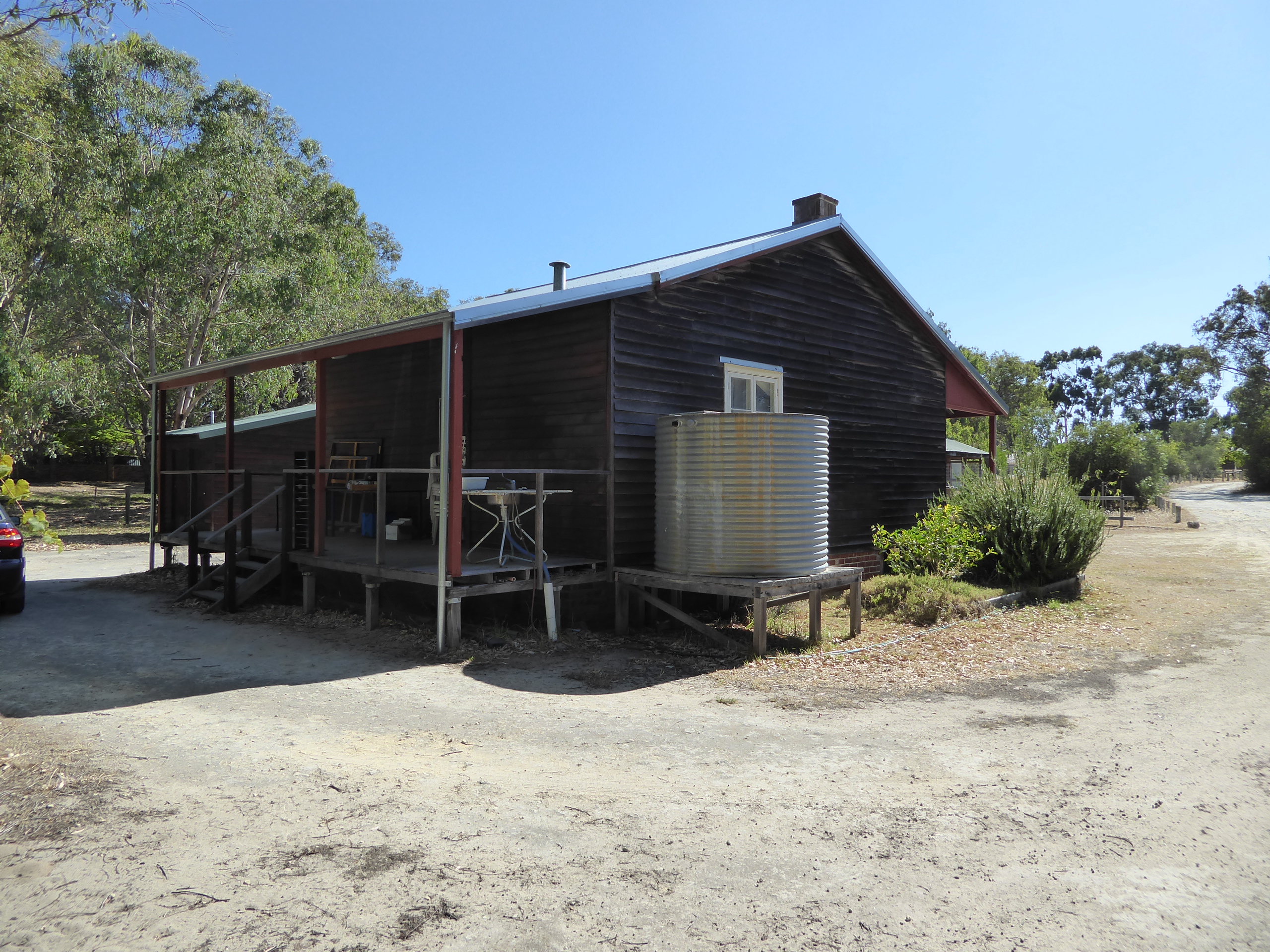 There are two verandas, and four interior rooms two 12 x 12 and two 12 x 14. There's a water tank for the kitchen, but there's no bathroom,