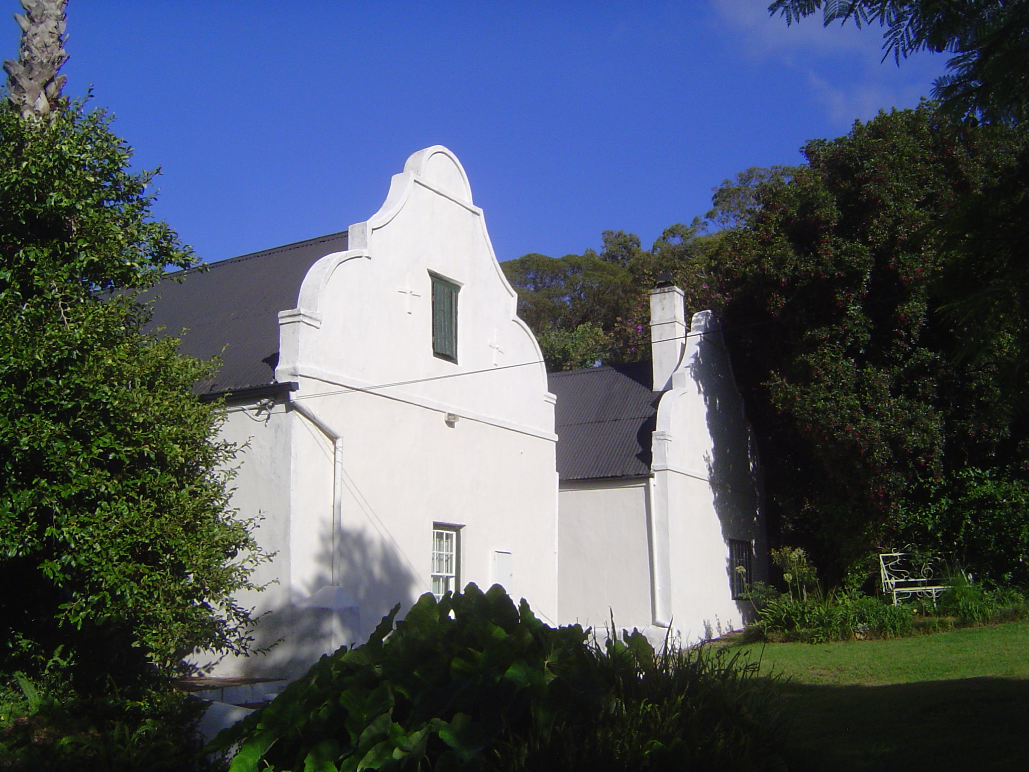 Still, the house is a big one, enlarged in 1847 to an H-shape with holbol end-gables.