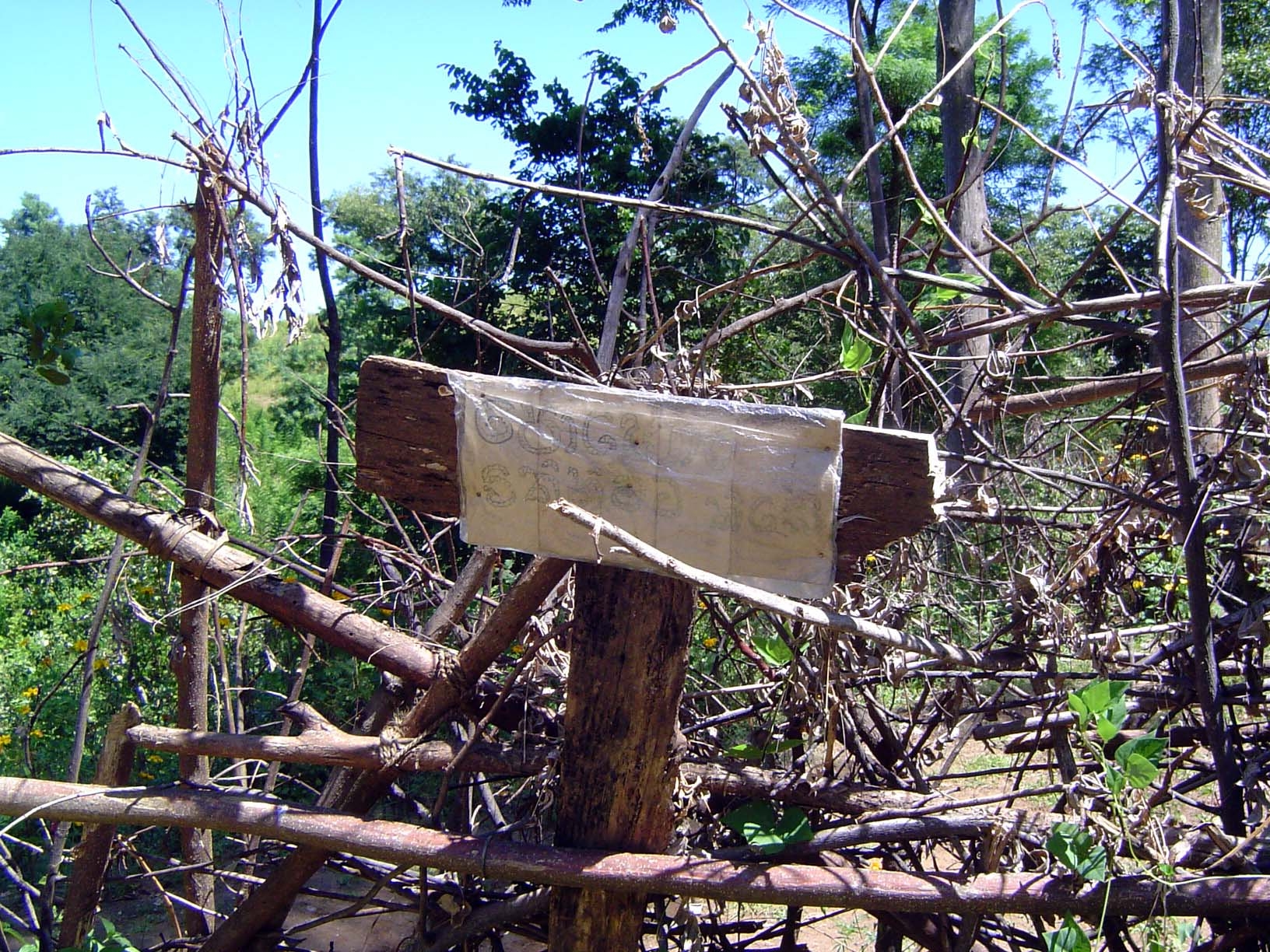 The sign advertises fertilizer for sale.