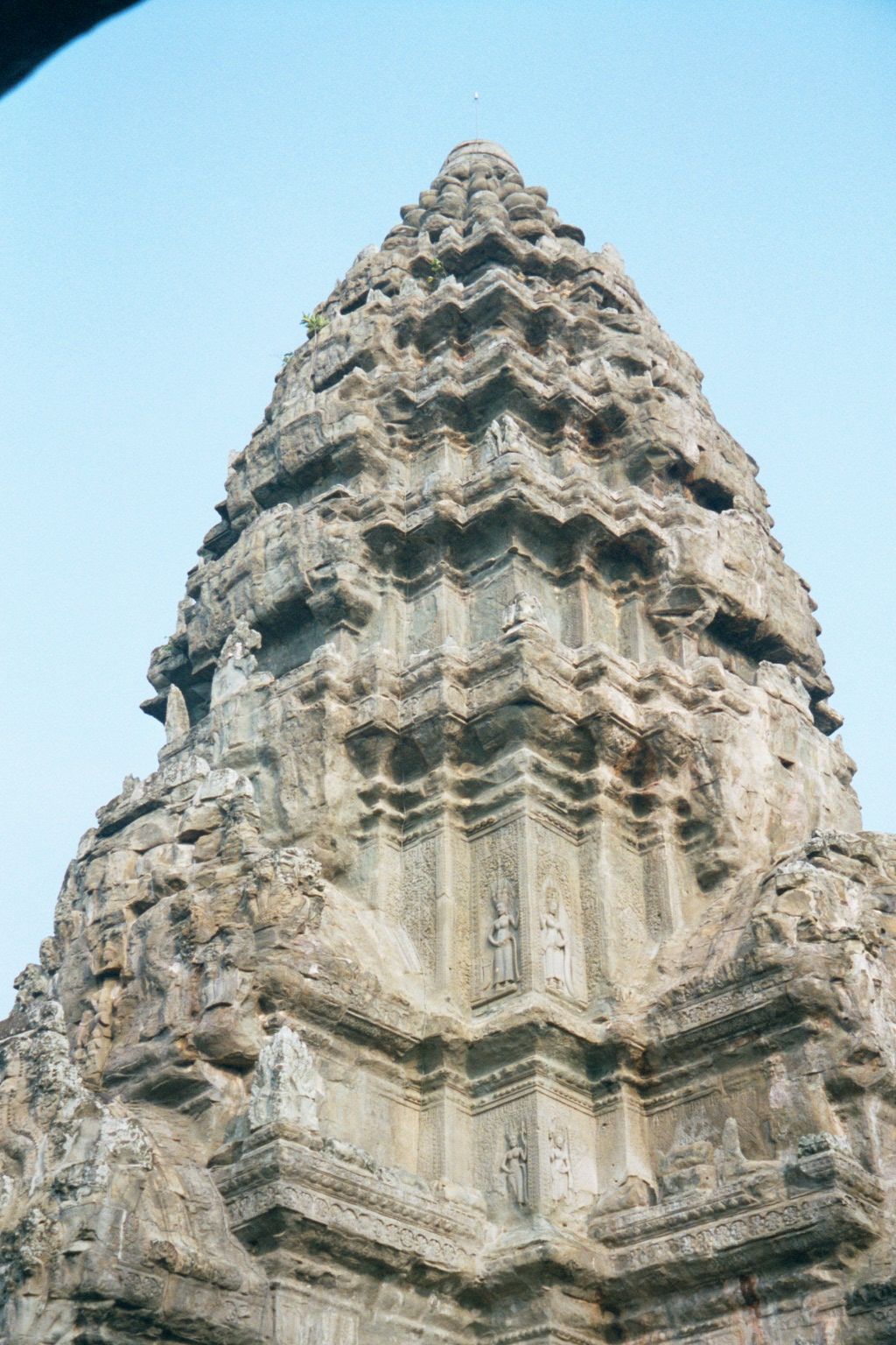 One of the five central towers, carved at the corner with a few of Angkor Wat's nearly 2,000 apsaras or celestial dancers.