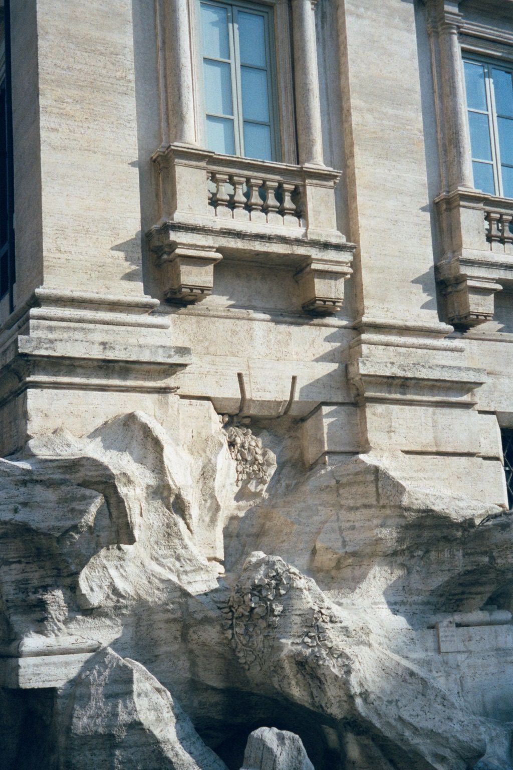 The fountain appears to grow out of the Palazzo Poli, completed about 30 years earlier, in 1730.