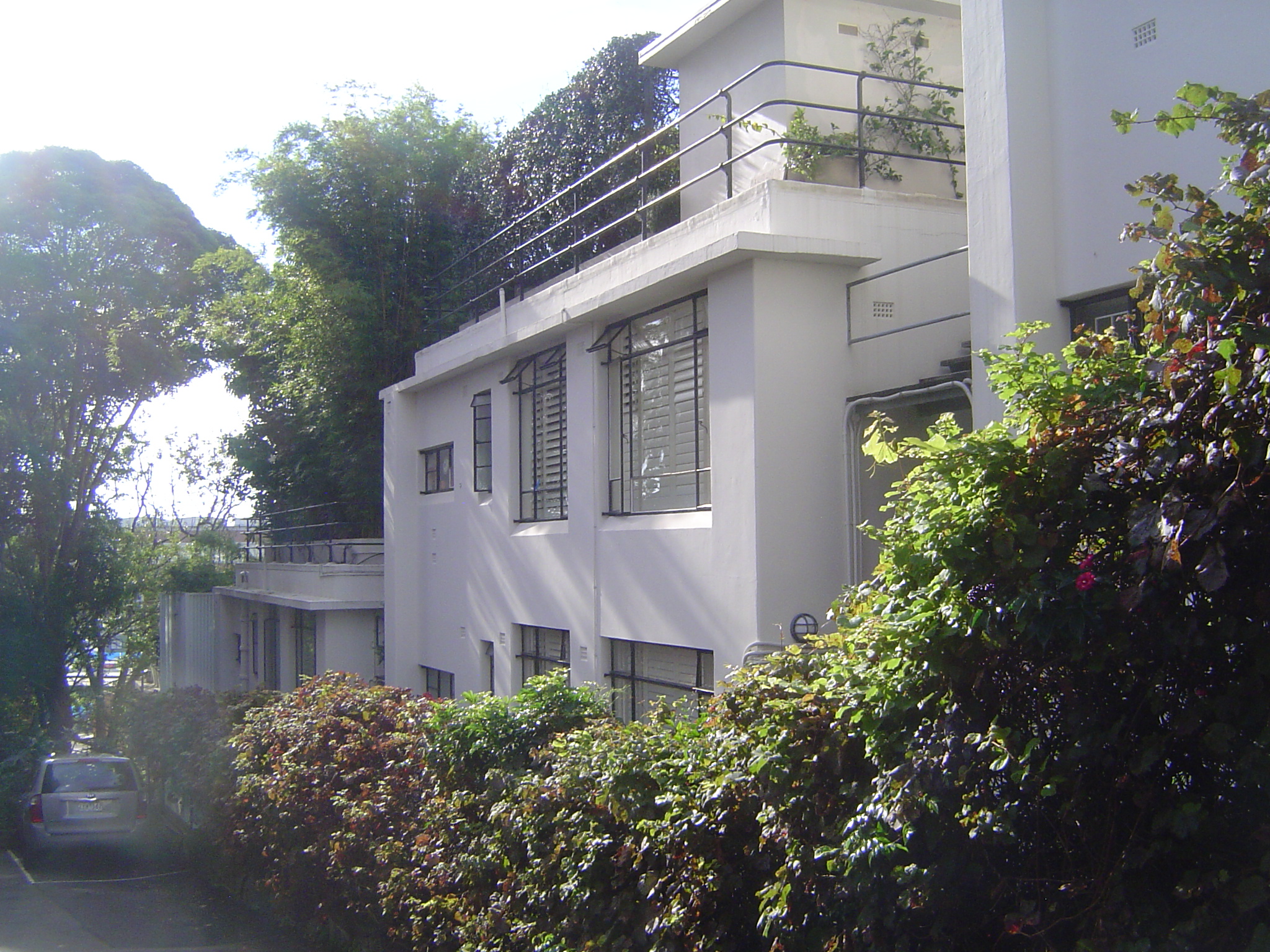 Not shown to advantage here but try as a passerby to get something better!, this is the back of the flat-roofed, concrete, Wyldefel Gardens.