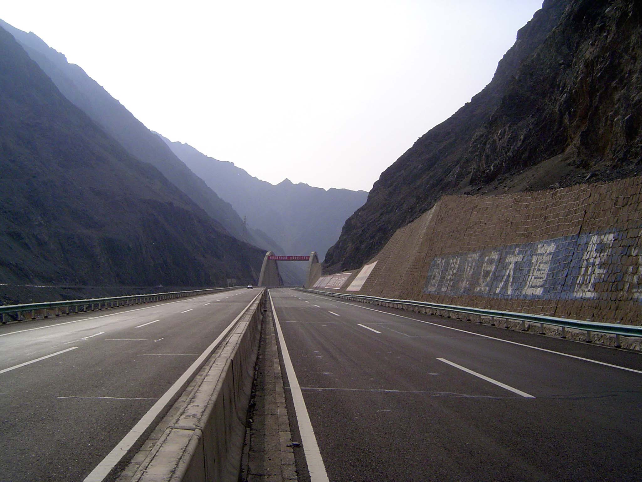 The route passes through a gap at the eastern side of the Tian Shan.