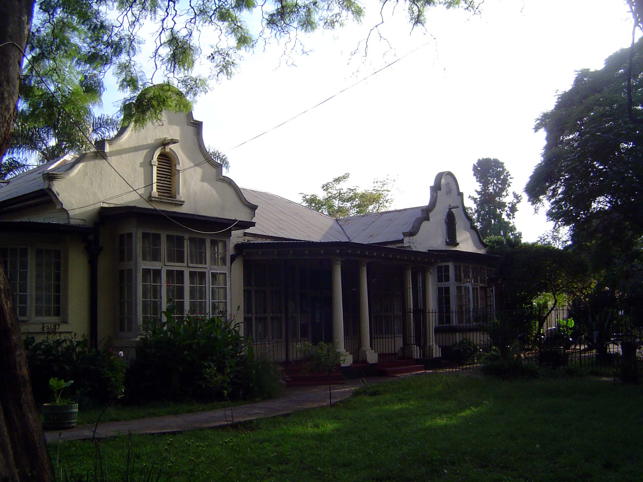 And another. It's a rare house that isn't of a single-story, set back as though in a patch of veld.