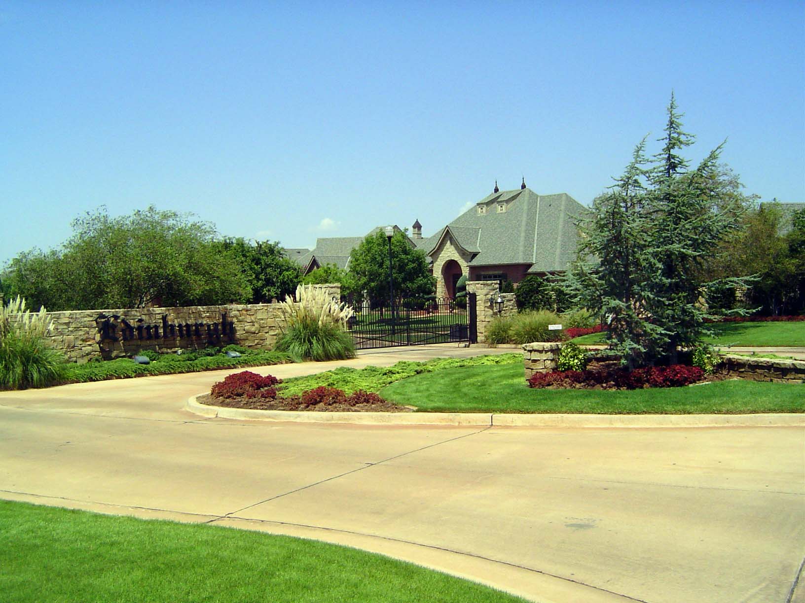 Still, you get a sense of opulent landscaping, as well as subdivision signage to die for.