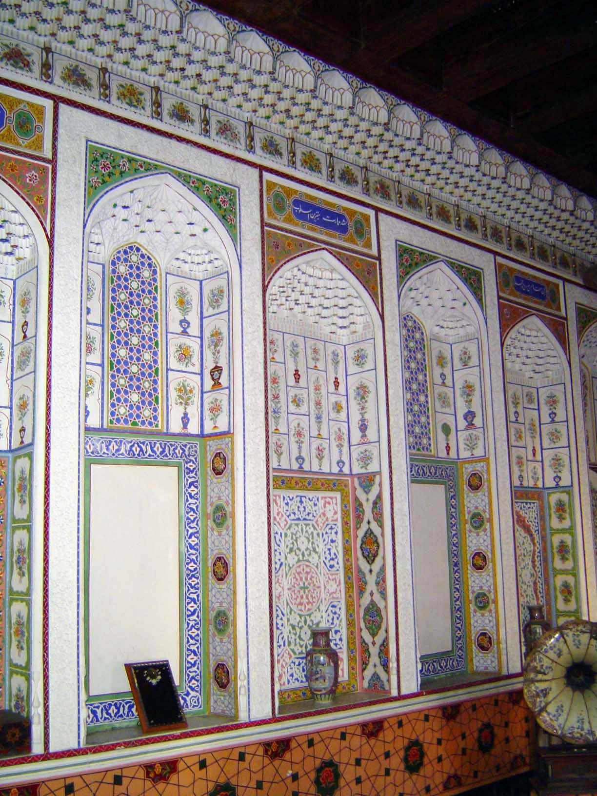 The entire length of the room is ornamented with ganch panels.