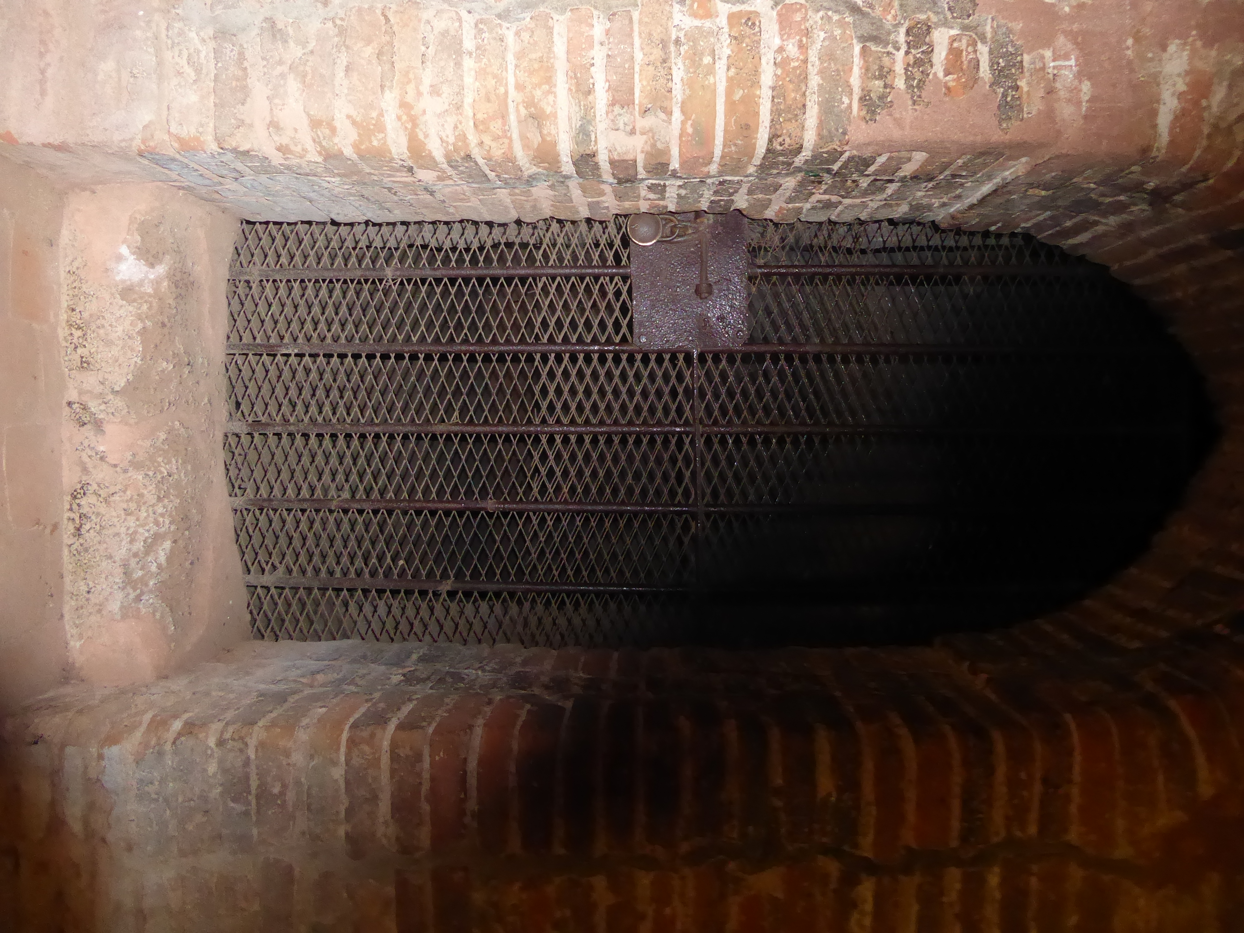 The shrine itself is locked and dark. Maybe you'll have better luck and be able to see what's inside, if anything.