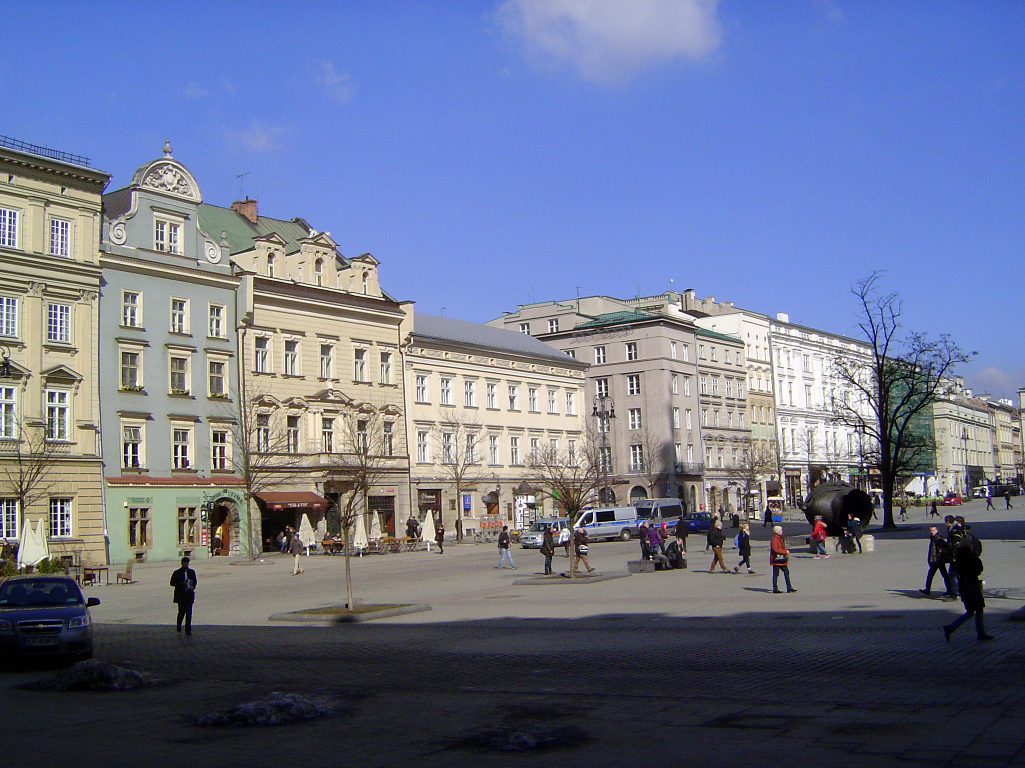 The west side of the square is fronted mostly by former palaces such as the Malachowski Palace, fourth from the left.