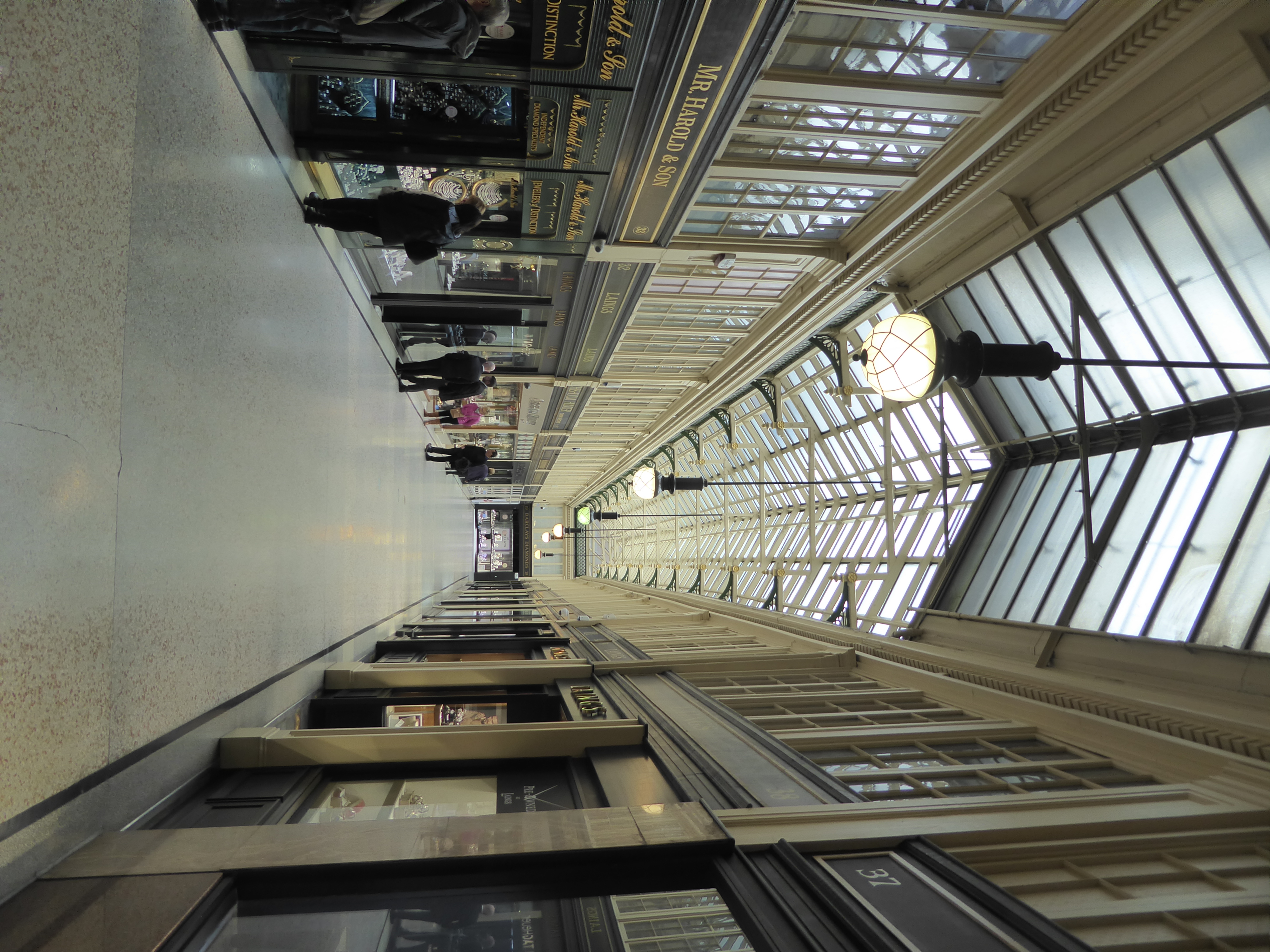 Here's something else that's unusual. It's the L-shaped Argyle Arcade, Scotland's first indoor shopping mall. It was cut through older resid
