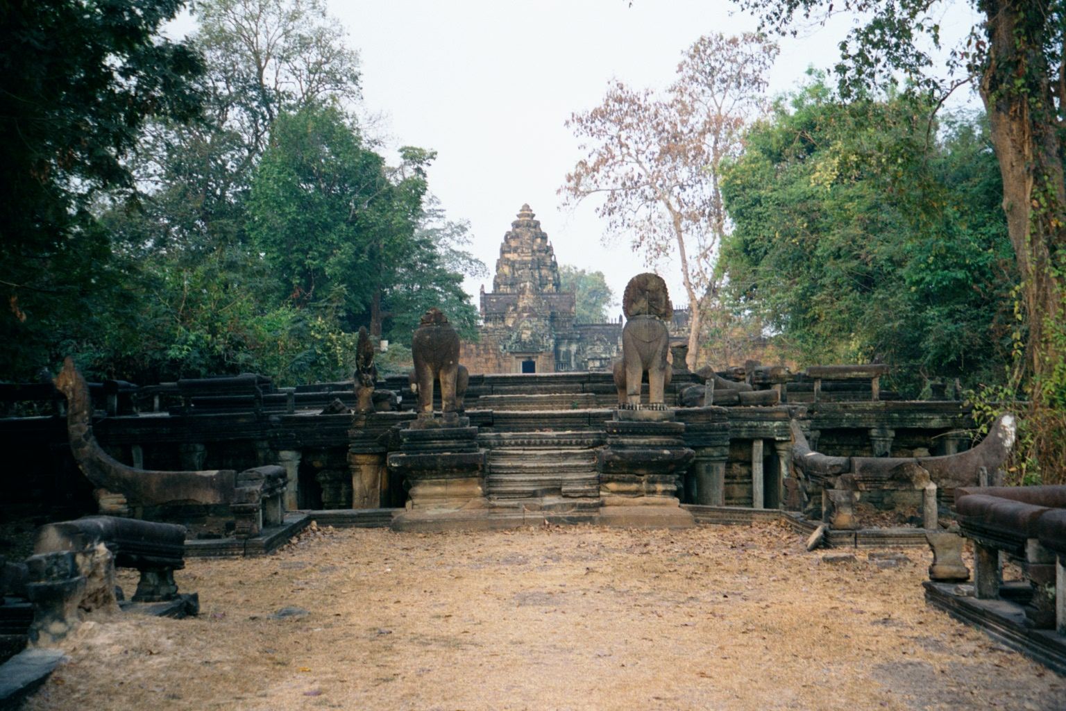 Here they are, with the temple's lone lotus tower rising between two lions.
