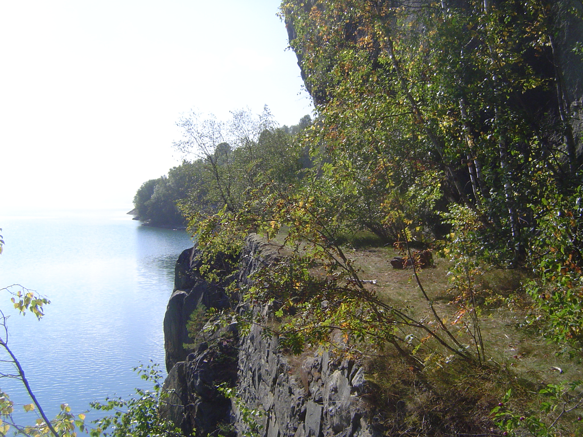 Where cliffs once forced roads to hug the water, now the roads barrel through tunnels—lots of tunnels. Here's an abandoned bit of old road s
