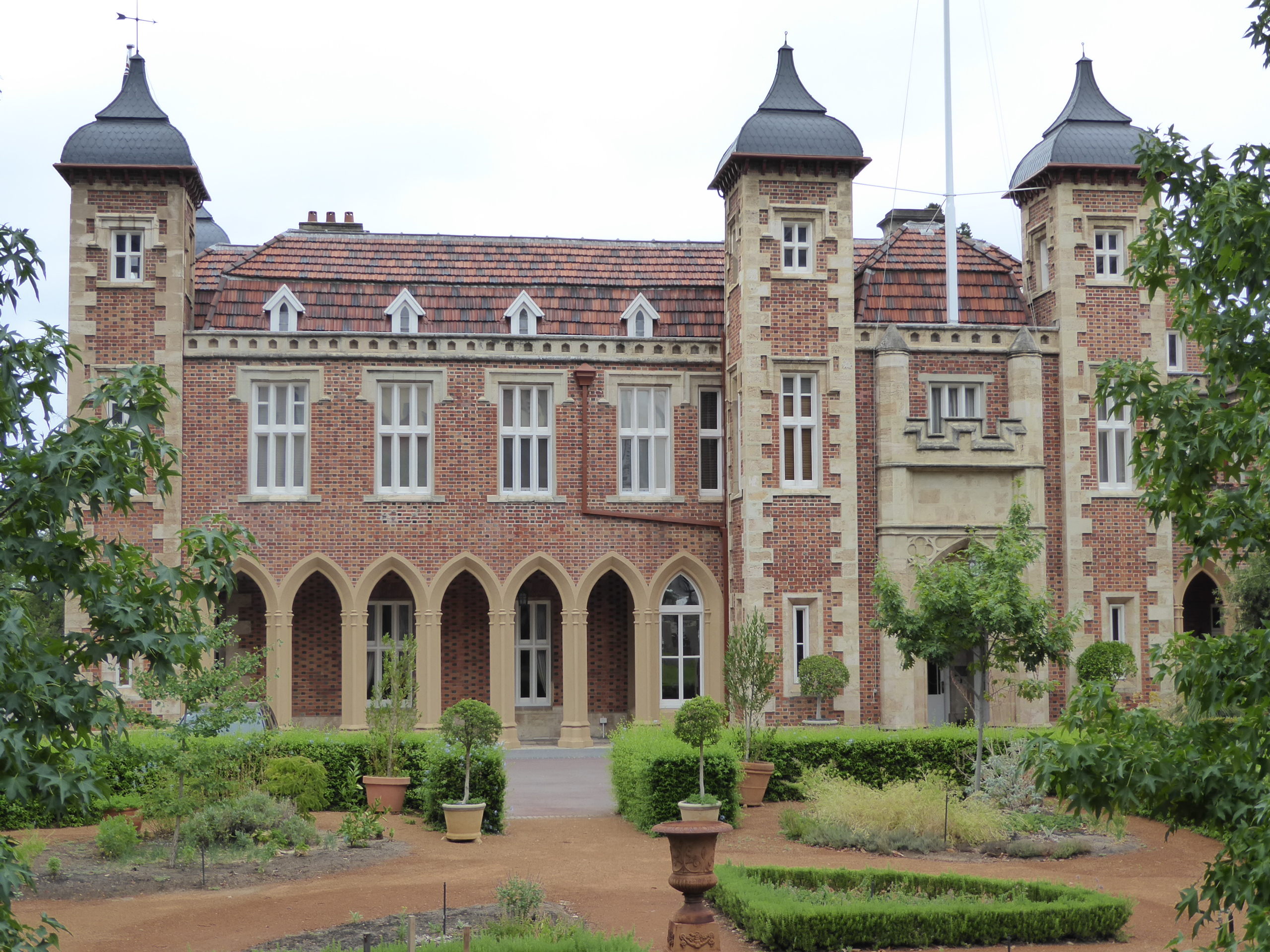 Anyway, here's a good view of Government House. Jacobean Revival with Gothic arcading. Date: 1863. My theory is that Milton Hershey came by