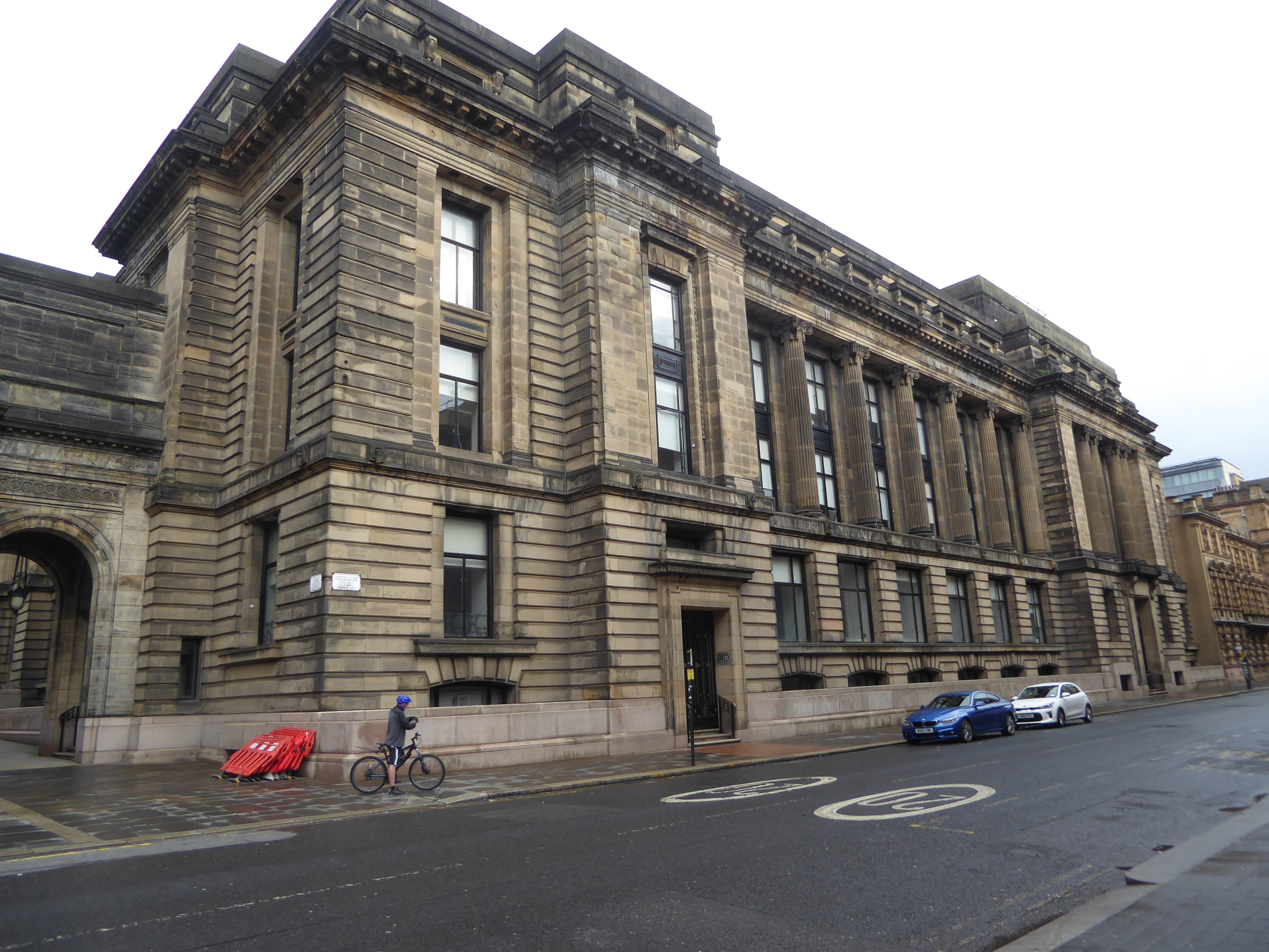 The City Chambers soon proved too small and by 1914 this depressingly sober extension or east block had been added.