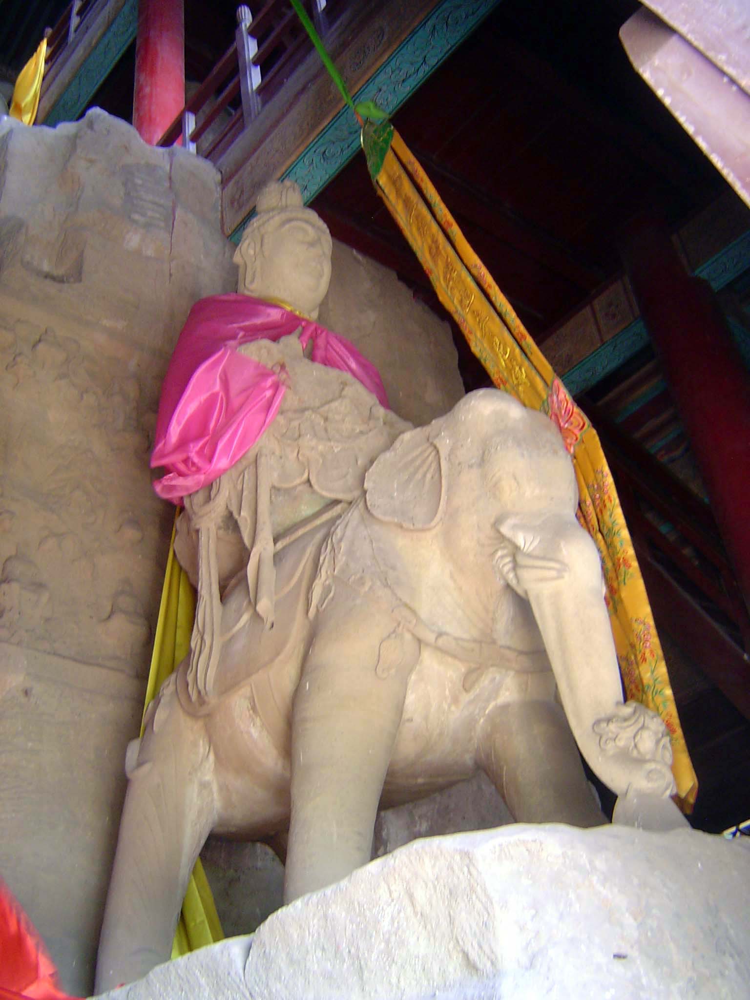 Samantabhadra, the Bodhisattva of Practice, rides an elephant.