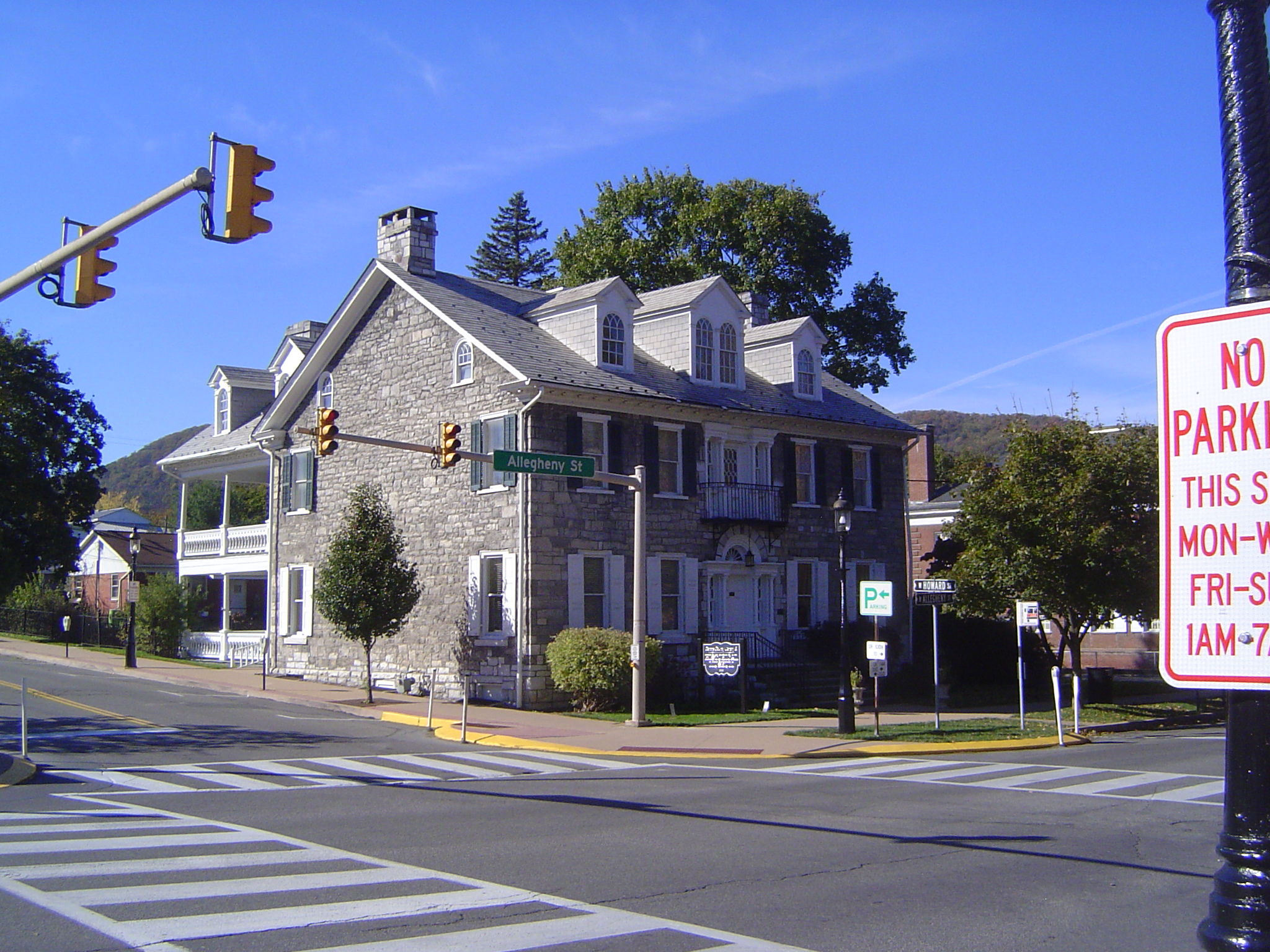 A few years later, in 1814, another ironmaster, Joseph Miles, built this similar but bigger house, on the verge of mansiondom. The porch at
