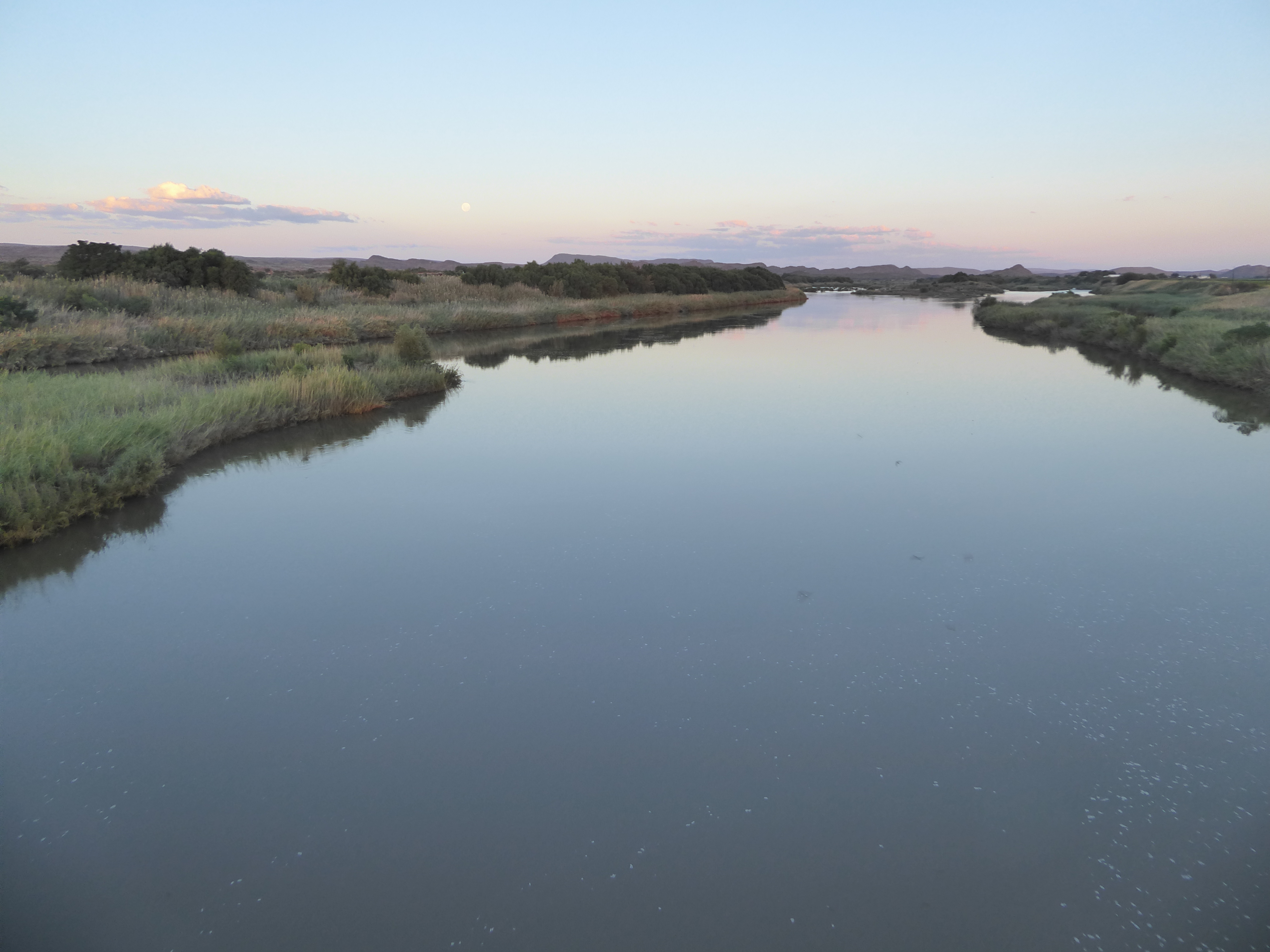 Time to look more closely at the river. Yes, that's the moon, rising at dusk.