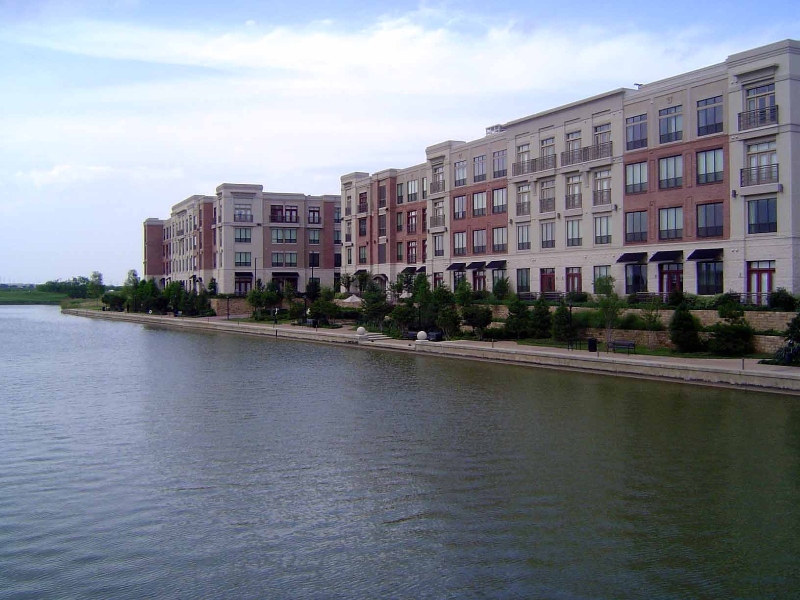 Water plays a big role in many of these developments, but here—the Delano Apartments at Las Colinas—the water is too big to be very welcomin