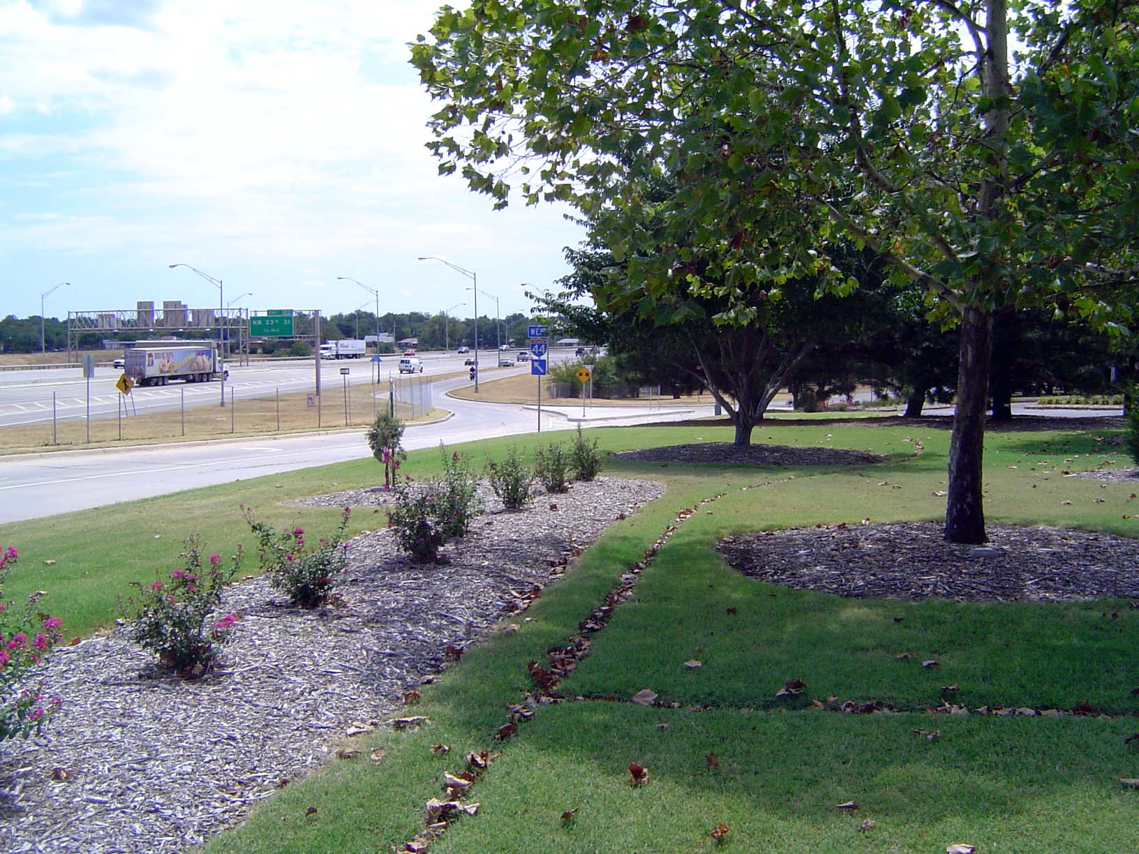 Highway engineers love parks so much that, given the chance, they'll run their pavement through them at every opportunity. Here, close by th