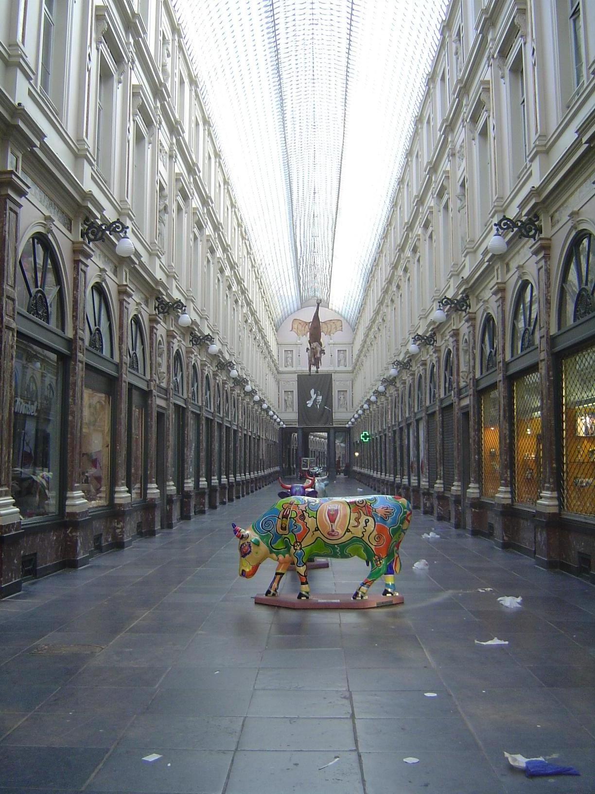 What do the bourgeois do? Shop, of course. Here's a proto-mall near the Grand Place. It's the Galeries Hubert, built in 1847 and 234 yards l