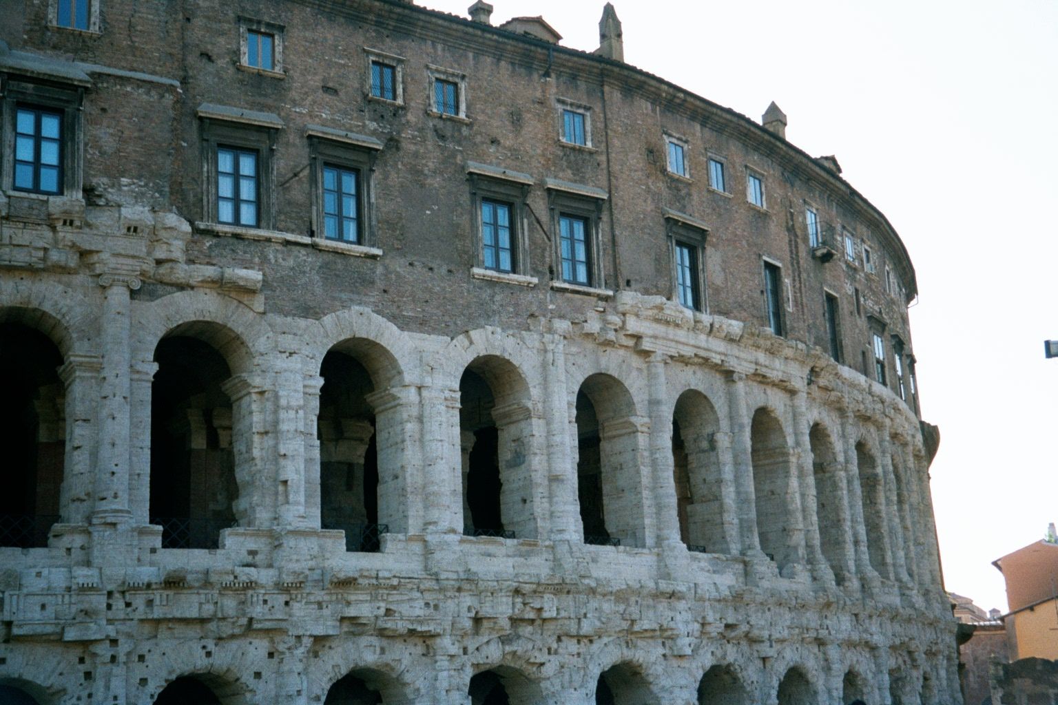 Rising to the Capitoline, the Theater of Marcellus, completed by Augustus and named for his nephew. The rising sequence of orders is Doric a