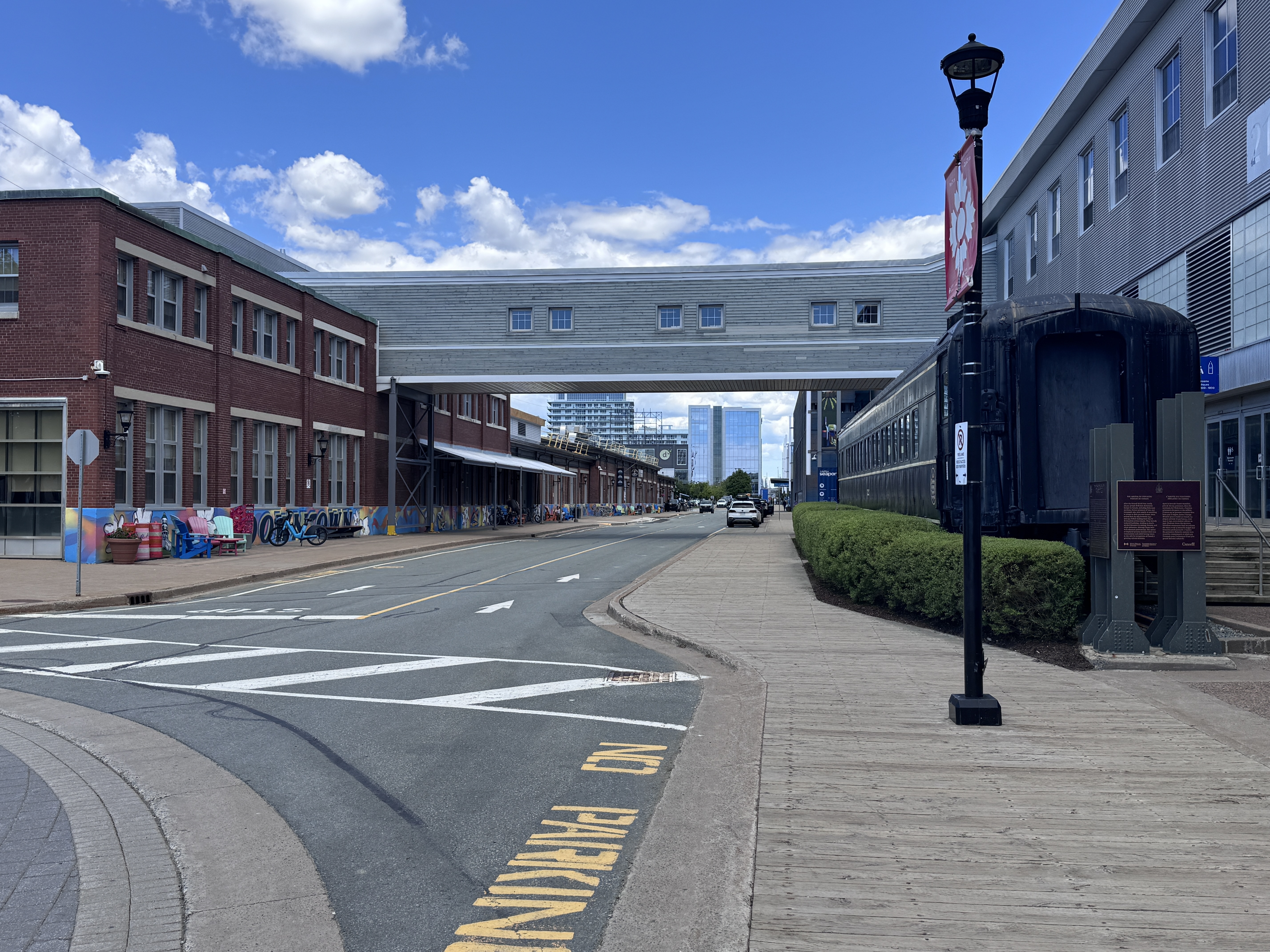 The bridge linked the immigration building on the right to the railroad station on the left.  The new arrivals mostly walked over and got on