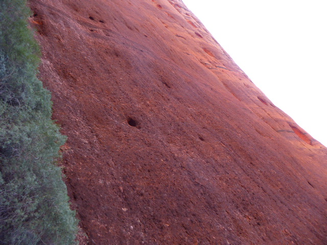 The rock forms cliffs as steep as Uluru.