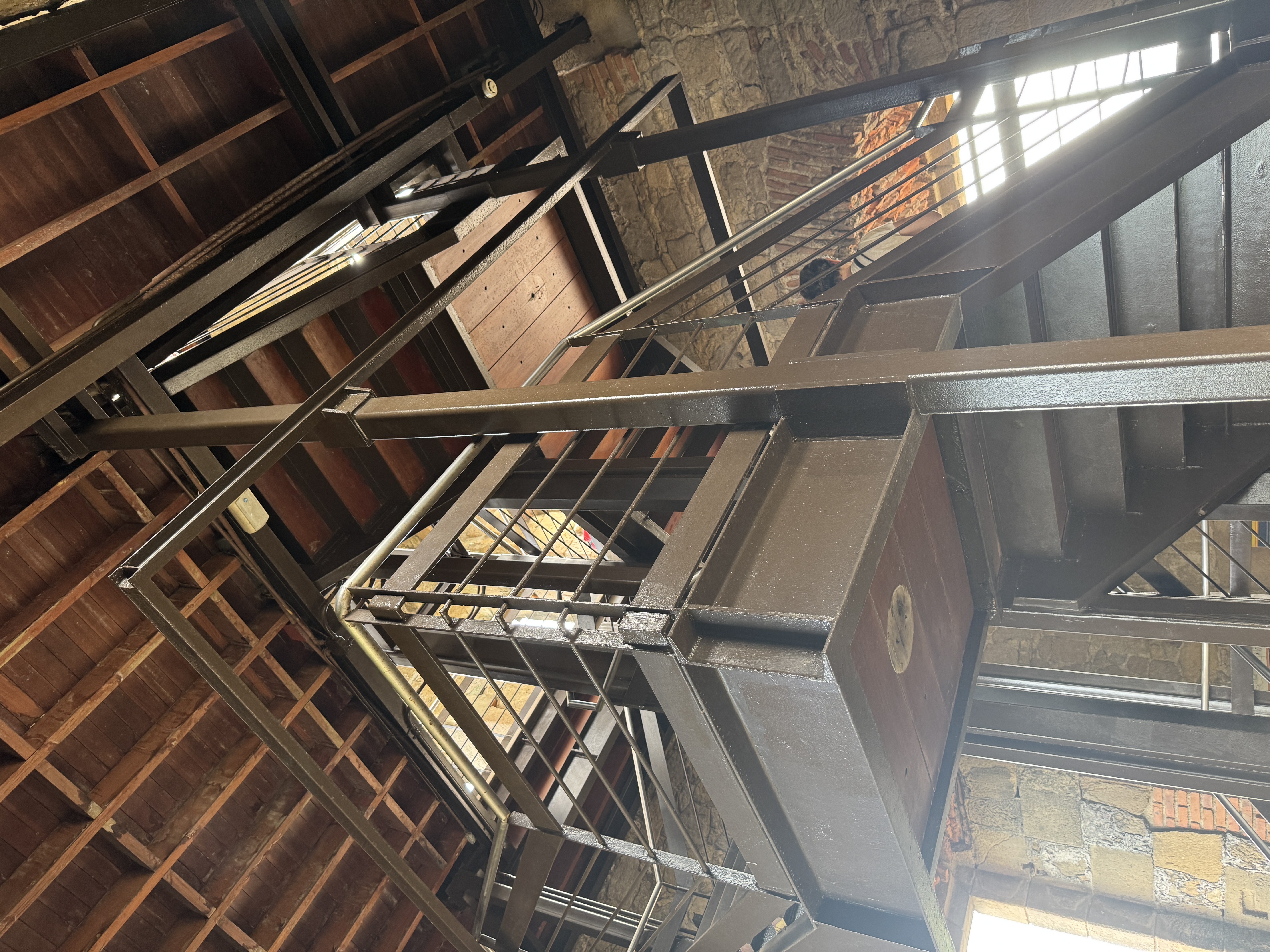 I do know that this interior stairway was added in 2006.  It stabilized the tower and simultaneously provided a viewing platform for visitor