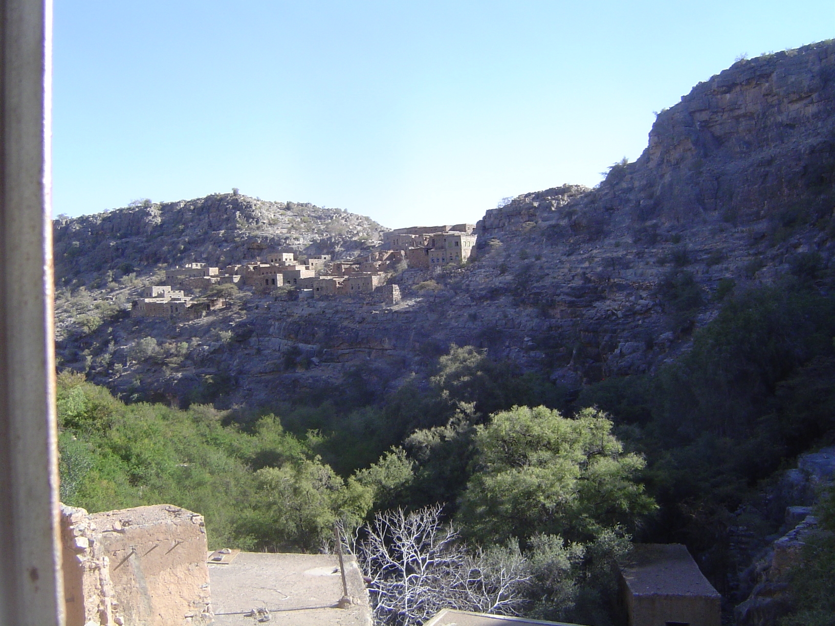 Window-view, with yet another down-wadi settlement.
