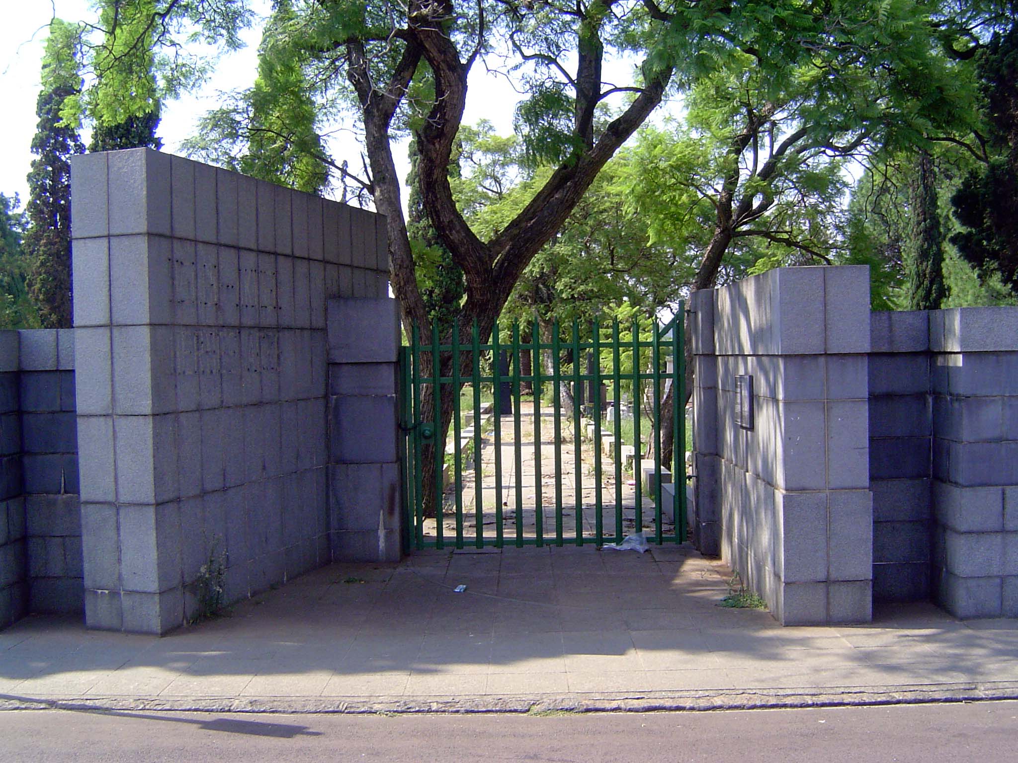 Locked tight. There's a reason: this is the entrance to the cemetery once called Heroes Acre, where apartheid's leaders were laid.