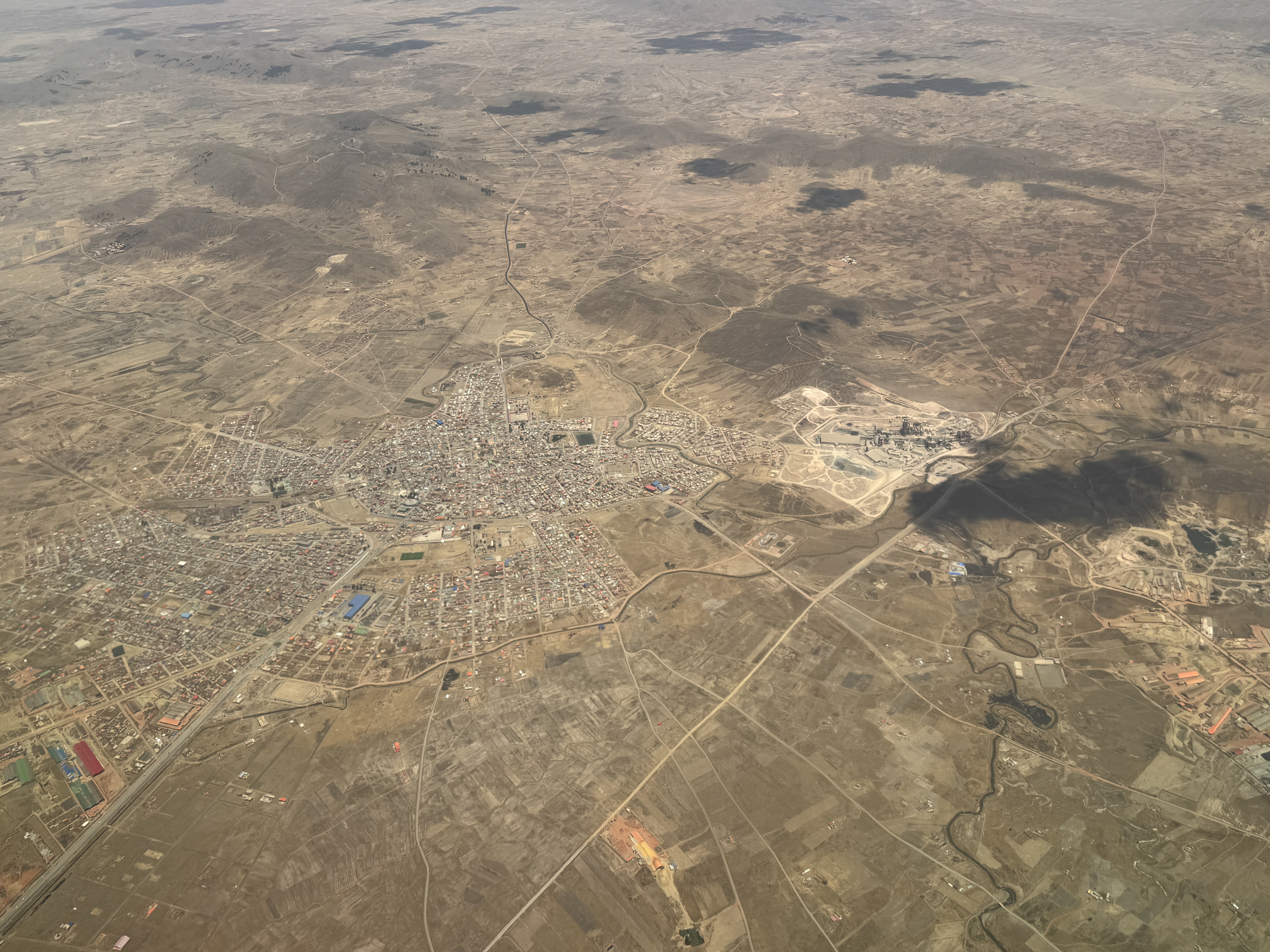 Here's Viacha, a dozen miles south of the airport.  It's a railroad center and the site of Bolivia's first cement plant.  The plant's limest