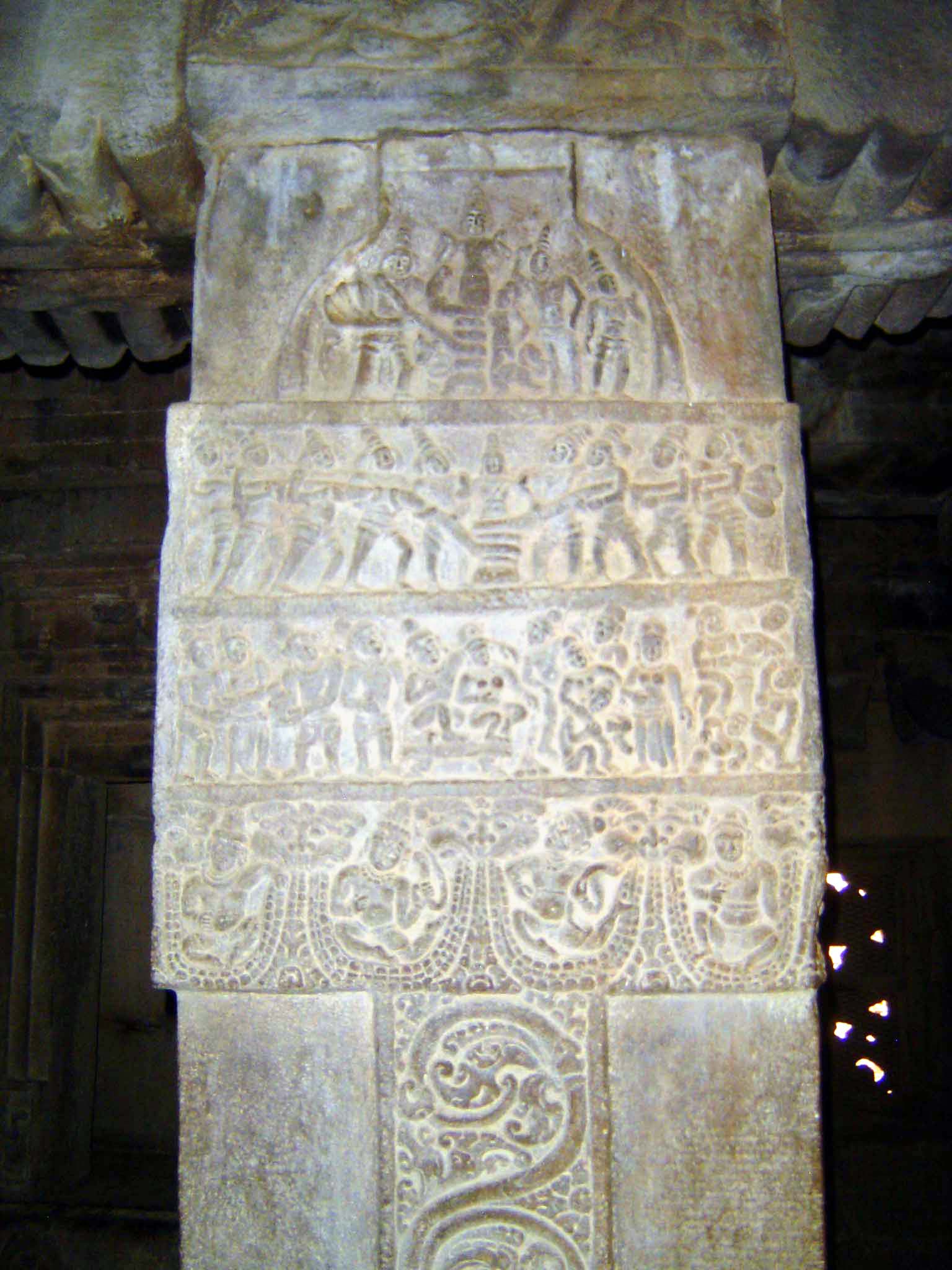 Here, the churning of the milky ocean as gods and giants pull opposite ends of the serpent Vasuki, his body coiled around the churn of Mt. M