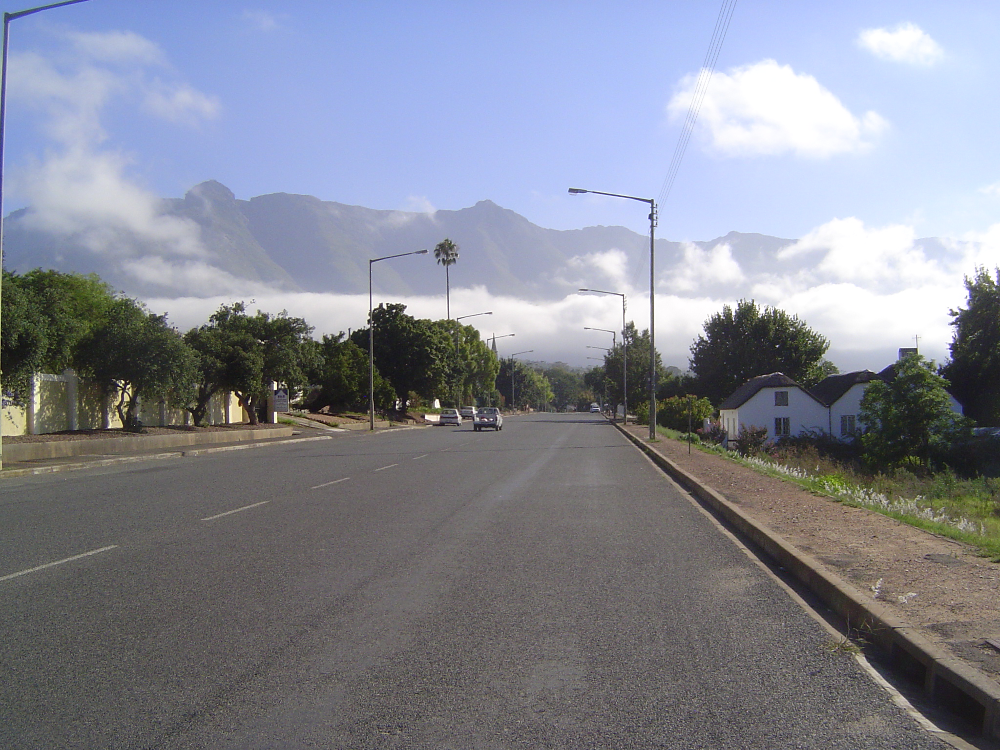 It was called Swellendam and grew slowly into a town today of 20,000, overseen by the Langeberg. Here the main street approaches the town ce