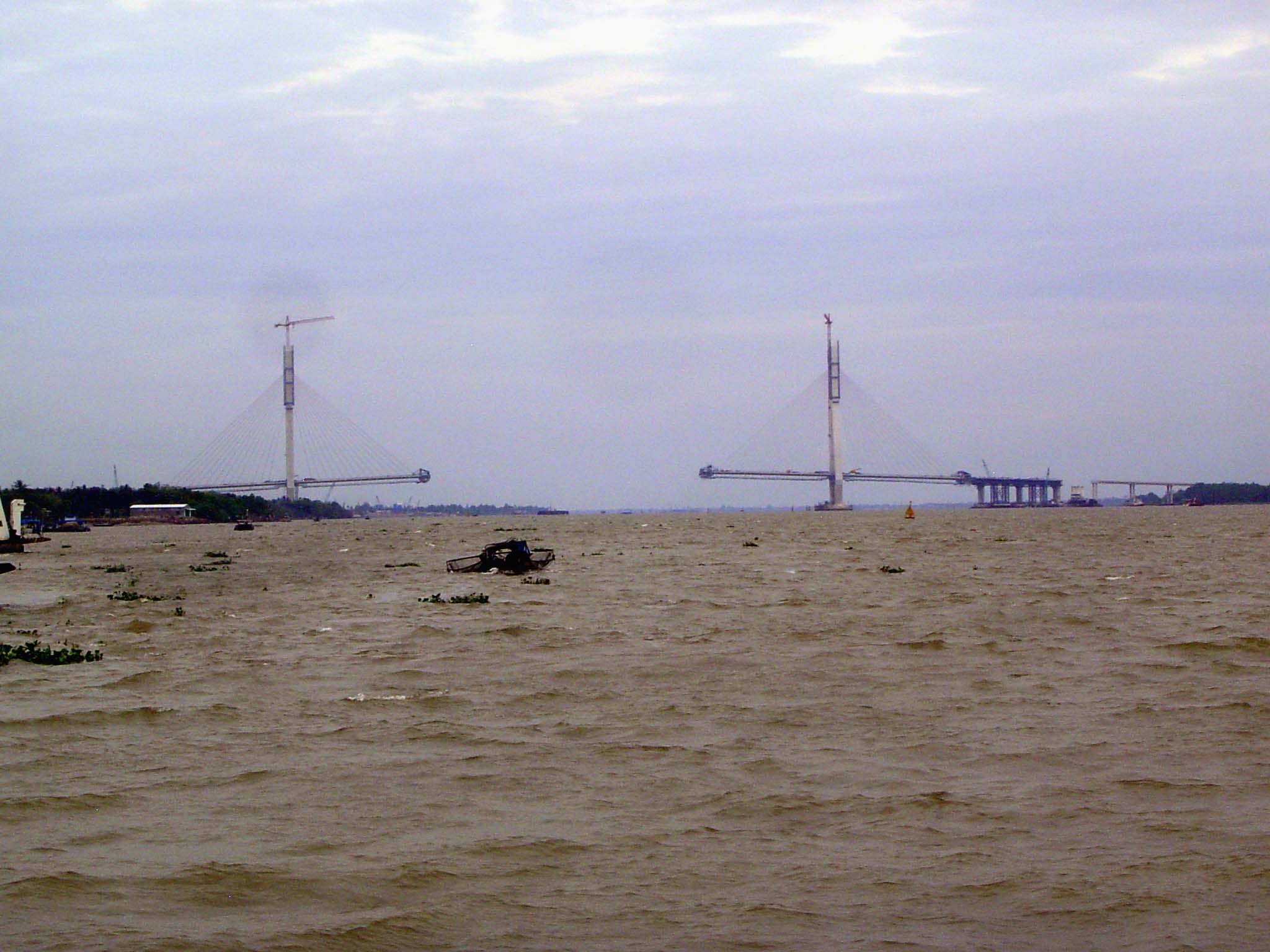 Trouble ahead for the ferrymen: a cable-stayed bridge under construction.