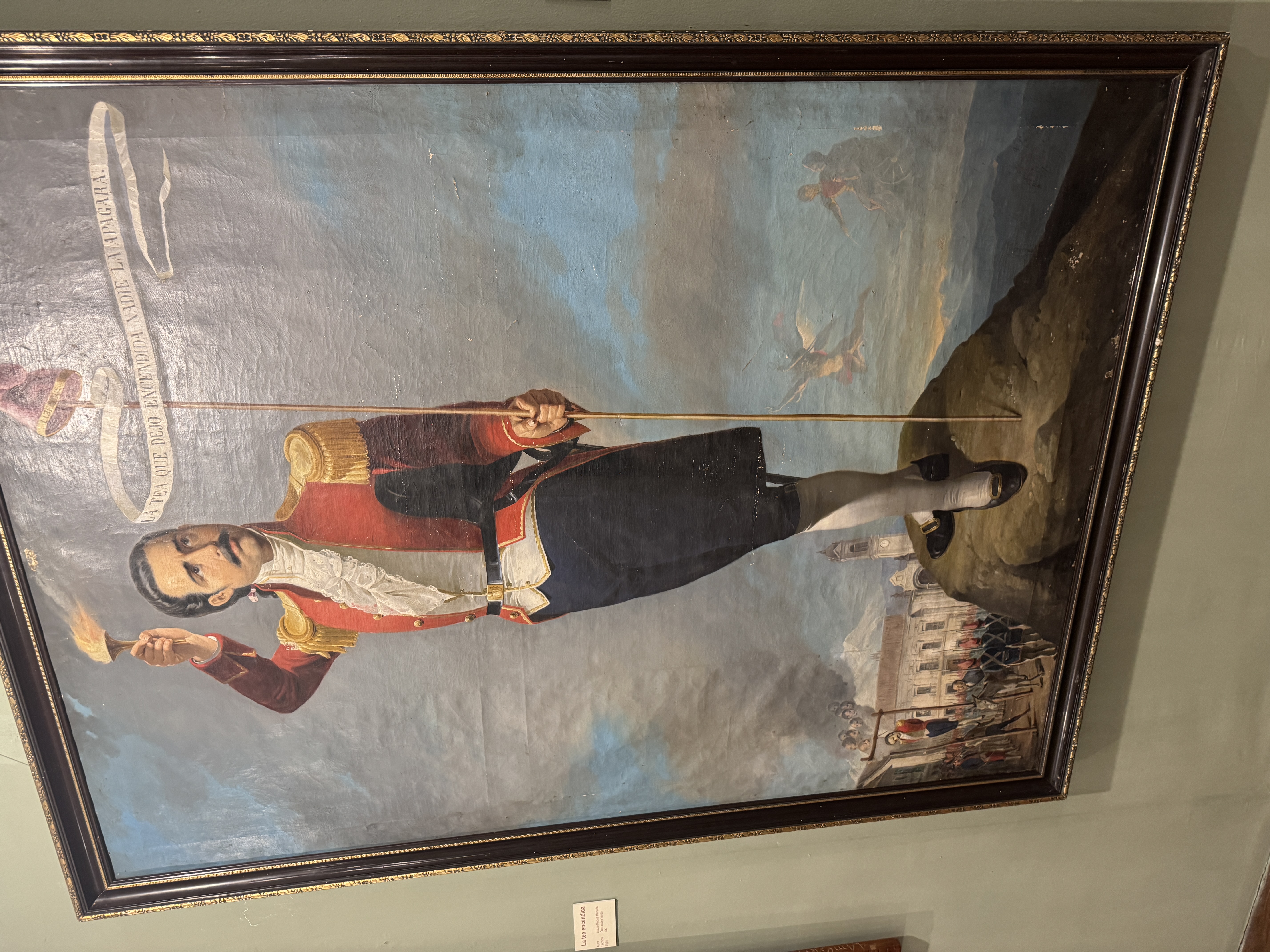 Here he holds the torch of freedom, which, as he said at his execution, would not be extinguished.