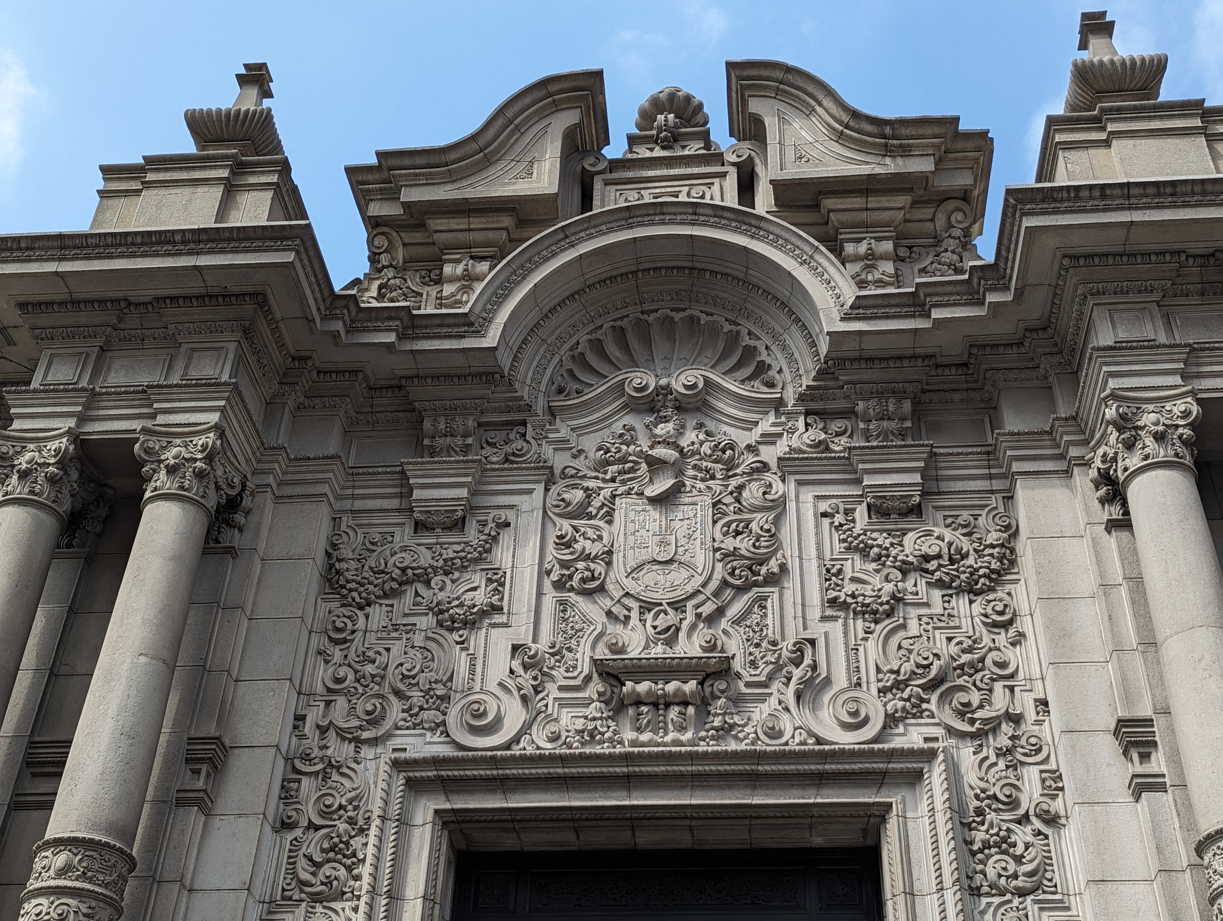 Ornamented door on the south side of the palace, fronting on the Jirón de la Unión.