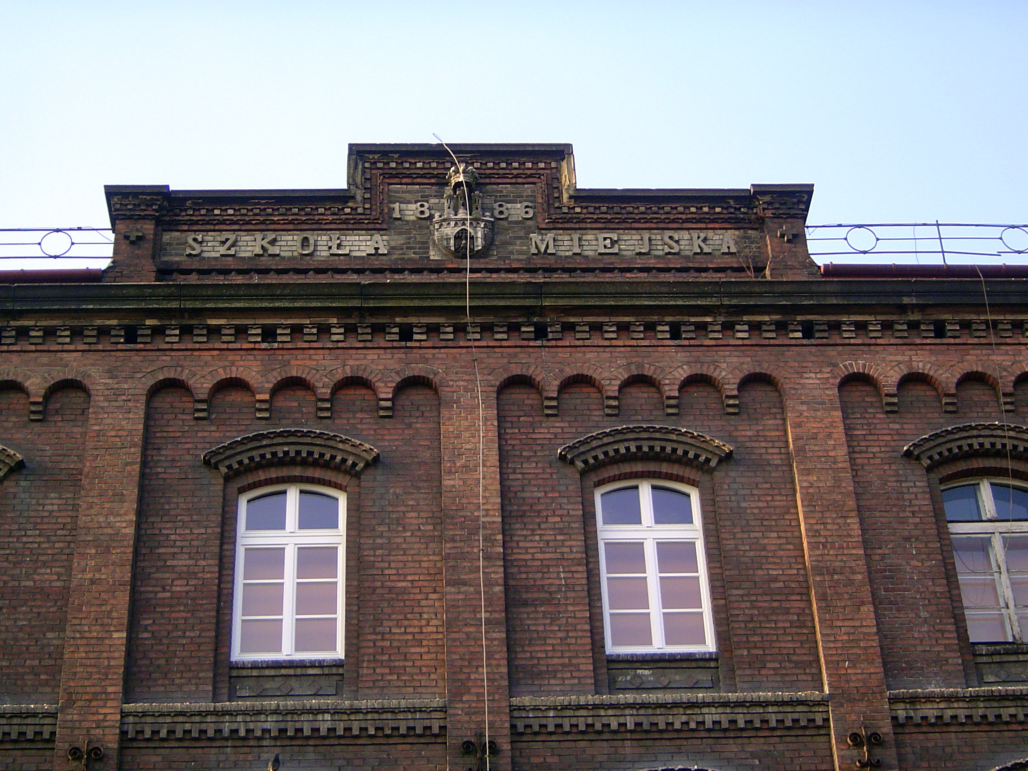 The words say Urban School, 1886. The school is in Kazimierz, the old Jewish Ghetto.