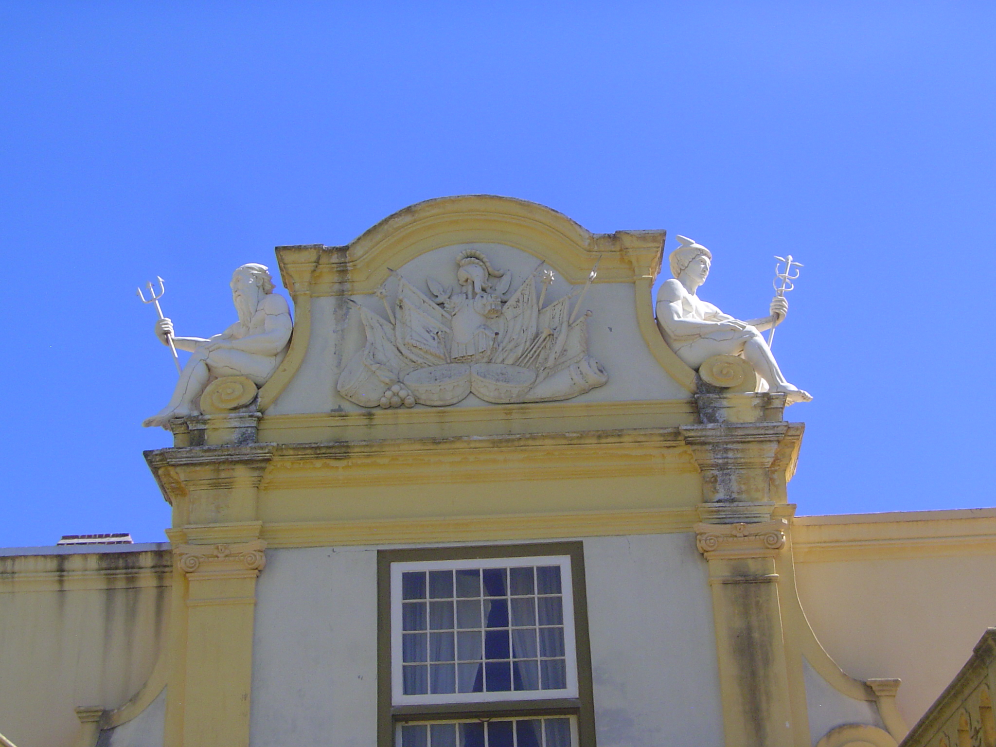 The flags are military trophies. Neptune and Mercury evidently take a break, not something you'd think gods needed.