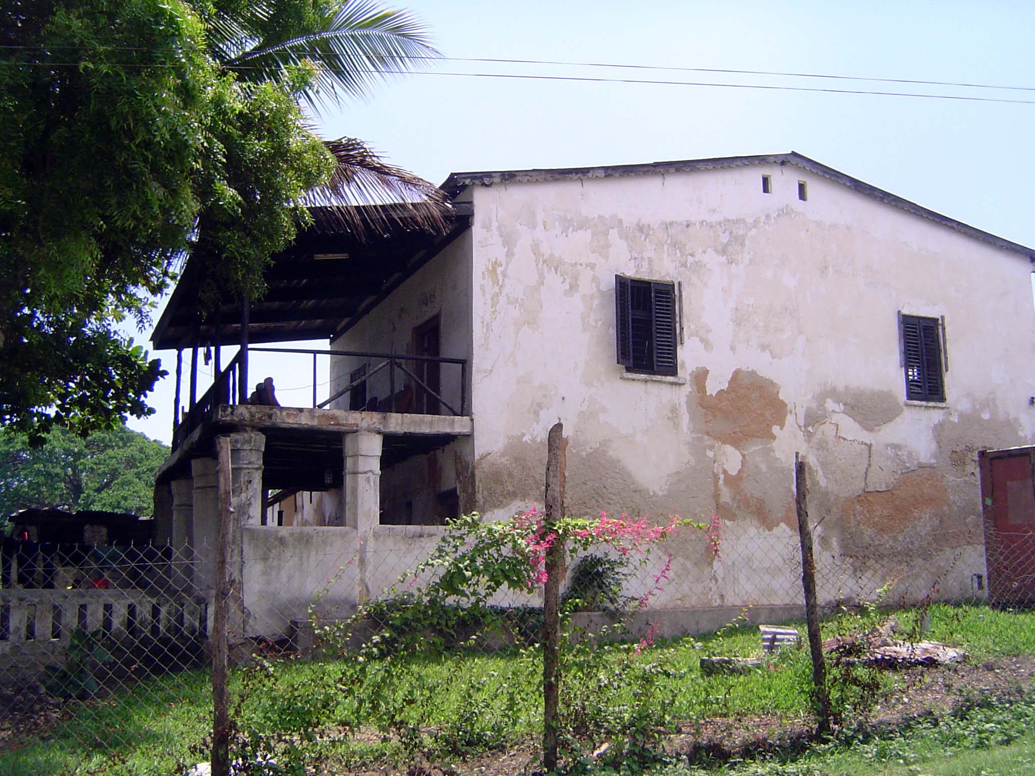 The rear of the same building has a covered deck.