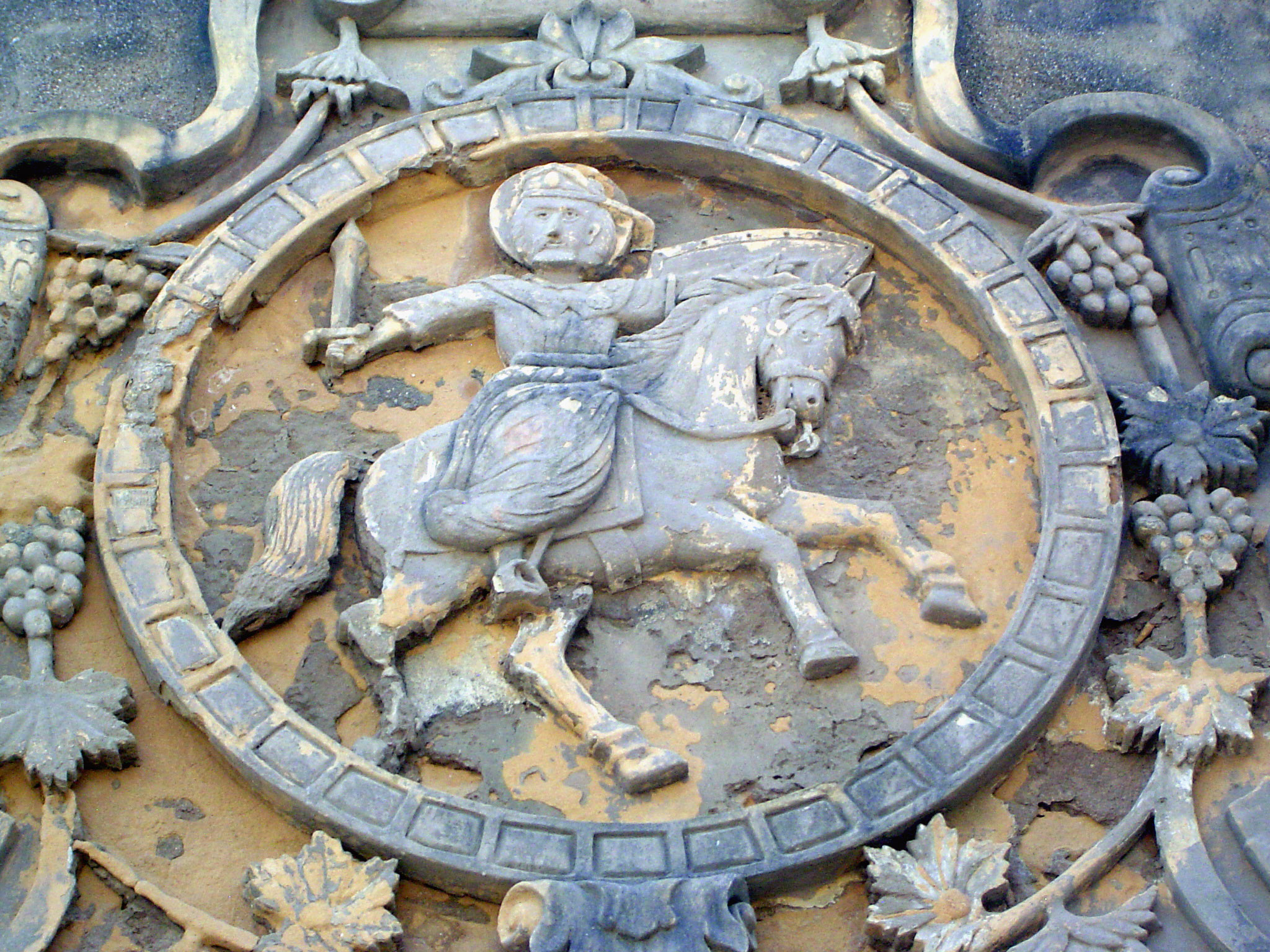 Bits of original plaster are left on the image of St. James, sword in hand as he presumably butchers the heathens.