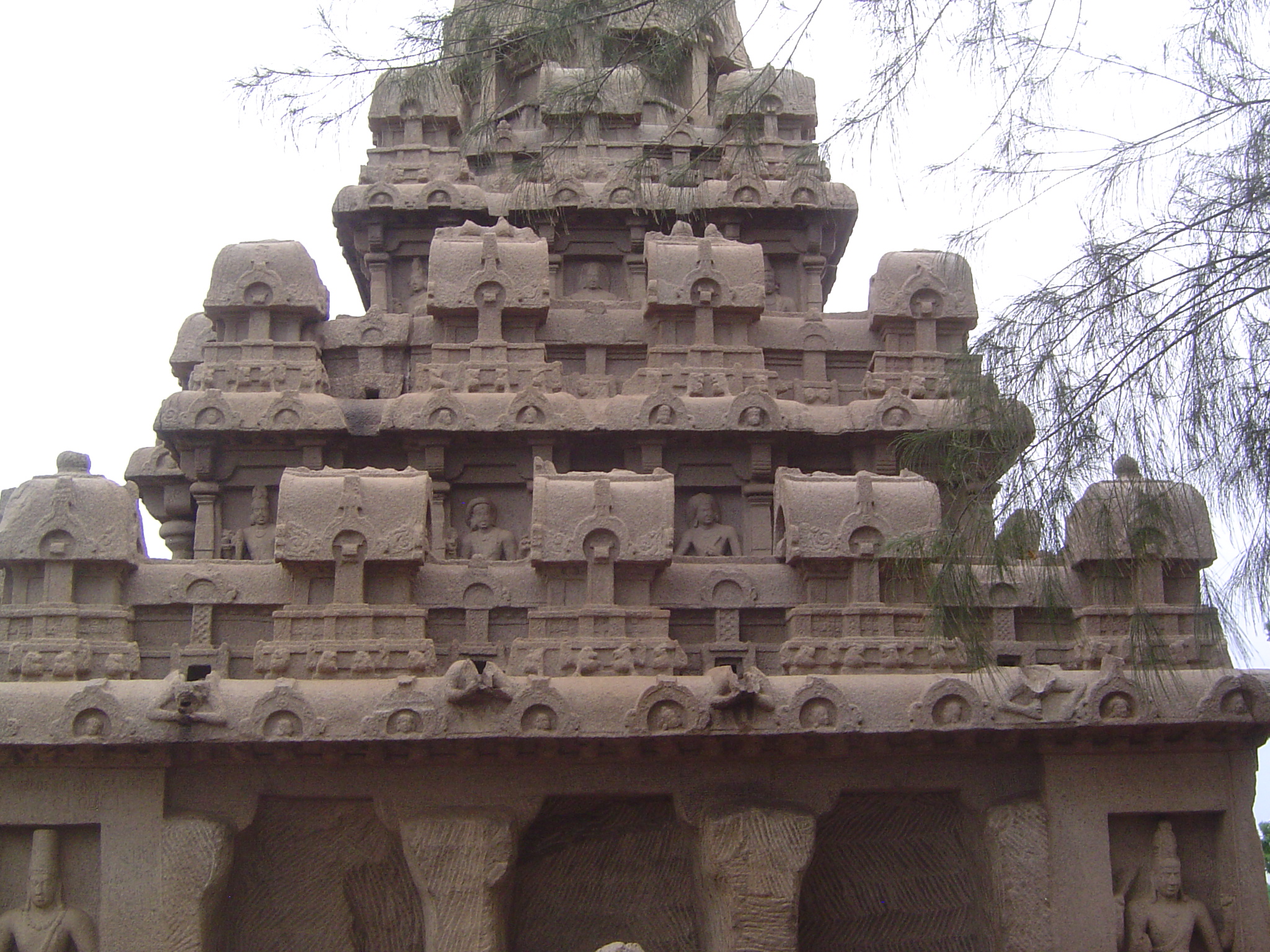 Figures peer from every level, although those on the lowest level have been decapitated.