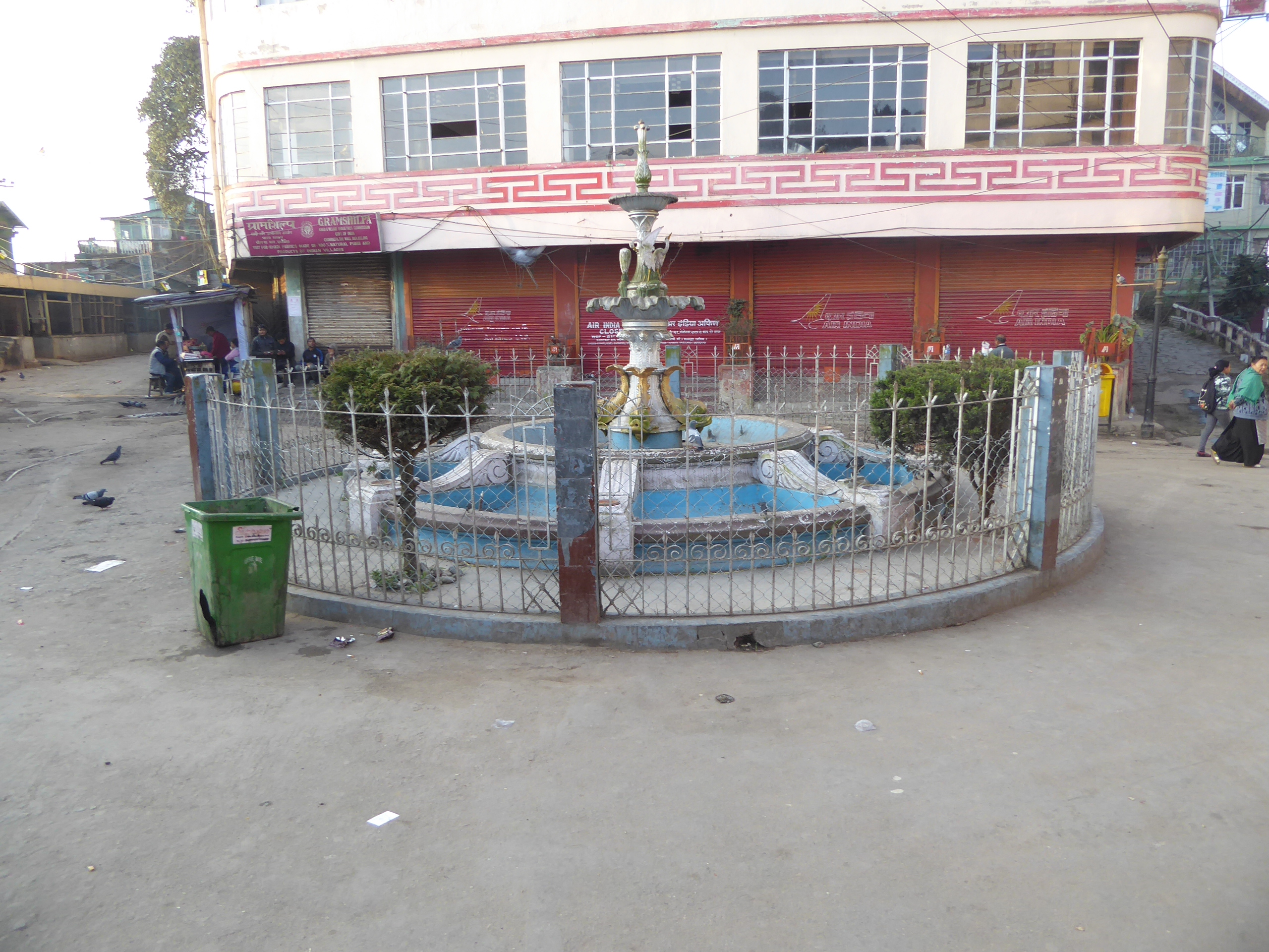 Then come over here to the other end of the plaza and this defunct fountain.