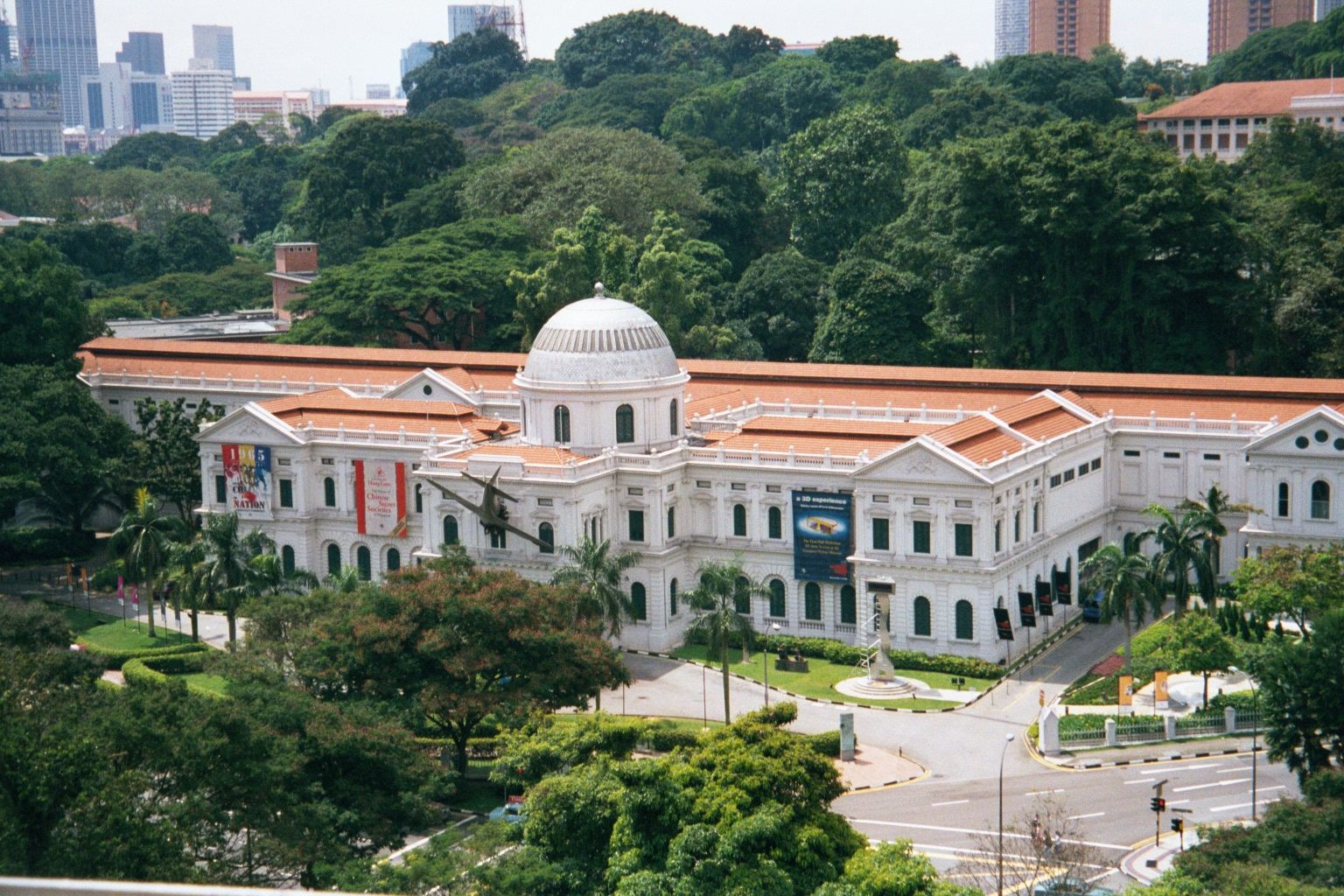 The National Museum, built for Victoria's Diamond Jubilee; behind it, Fort Canning Park.