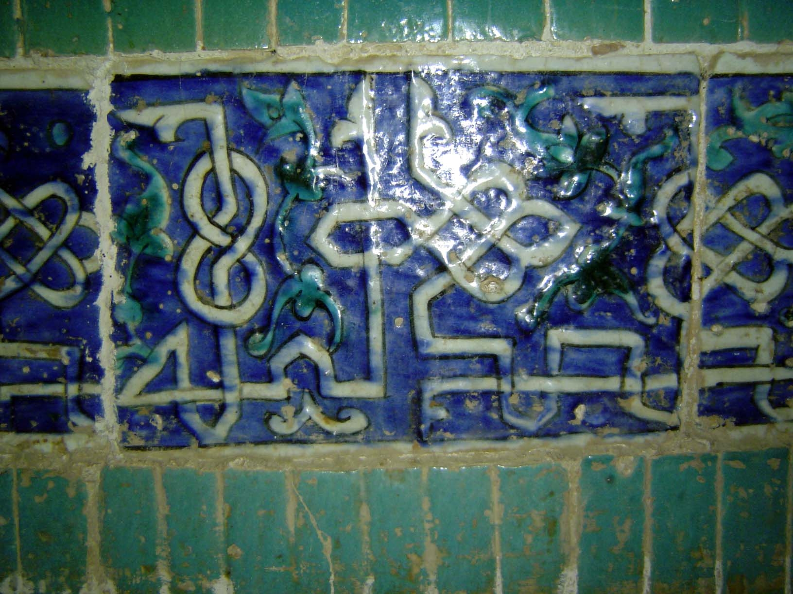Glazed tiles from the wall panels of the funerary chamber.