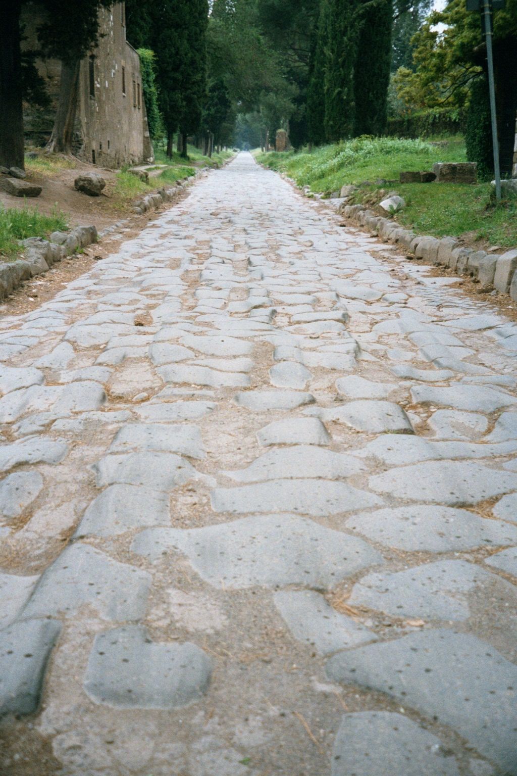 Parts of the road, however, are still paved with pozzalano lava, quarried locally in the second century B.C.