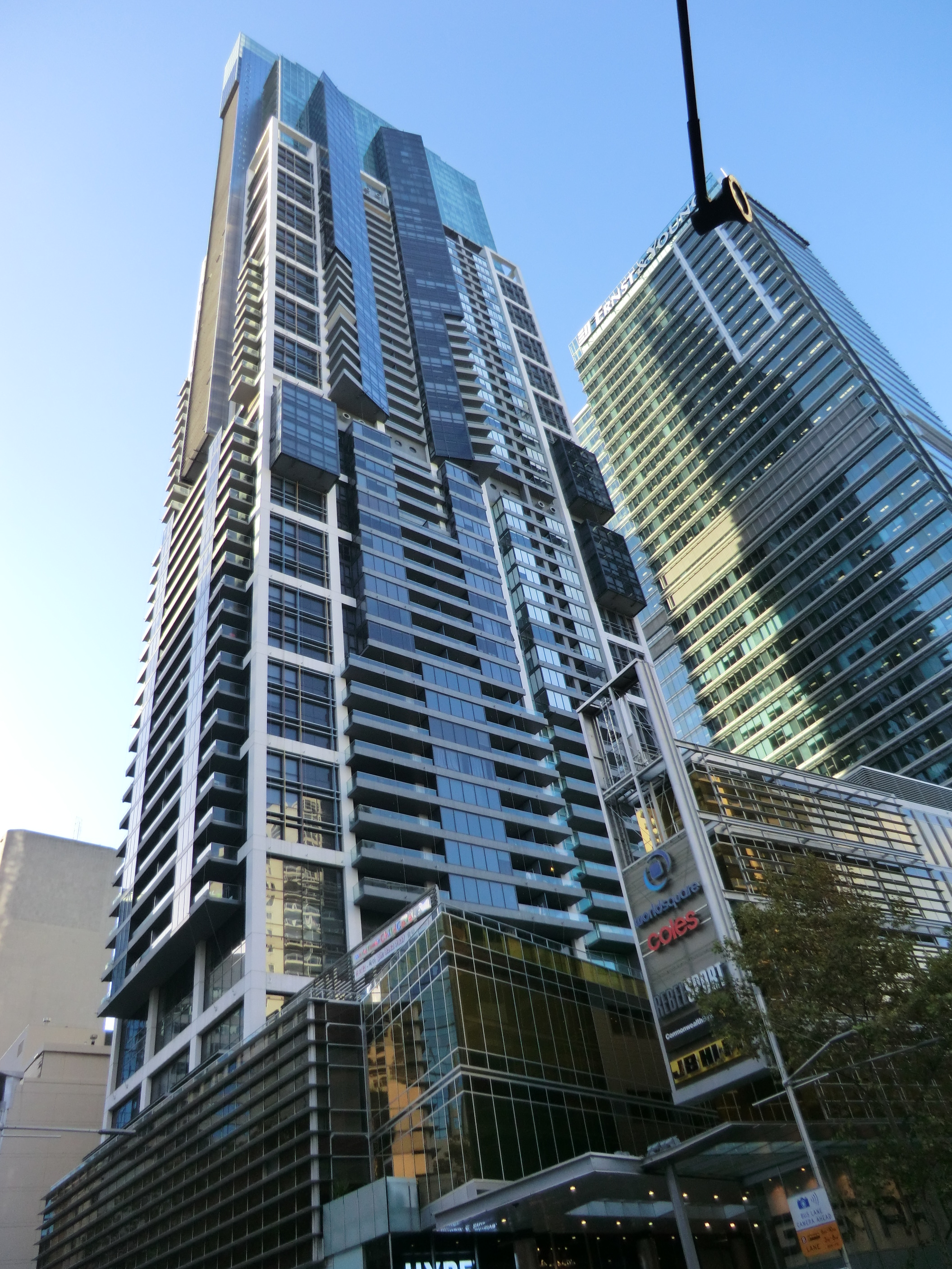 So Harry Triguboss comes along, reputed to be Australia's richest man but not richest person!. He builds apartment houses under the Meriton