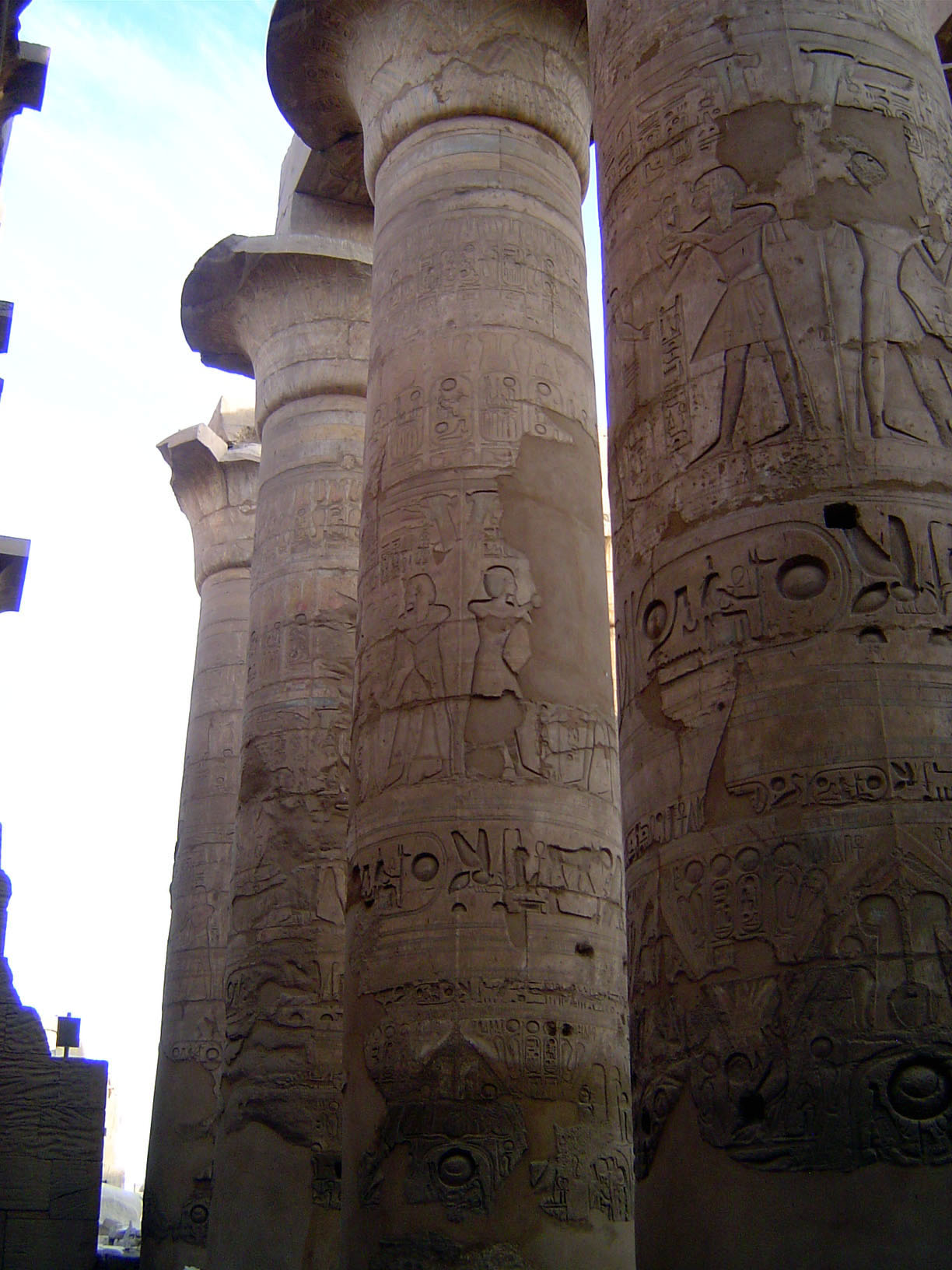 Farther west is the famous hypostyle hall, no longer roofed. This was a symbolic papyrus swamp, dimly lit with clerestories and symbolic of