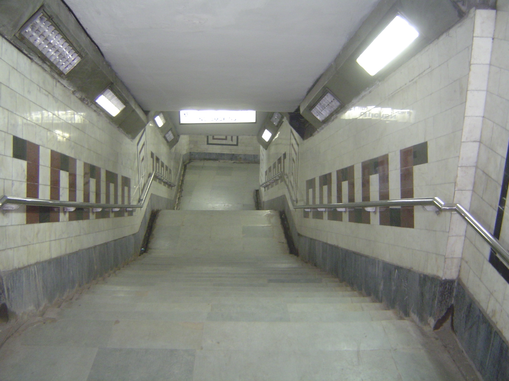 Calcutta does have one symbol of modern cities. We're headed downstairs, under Chowringhee.