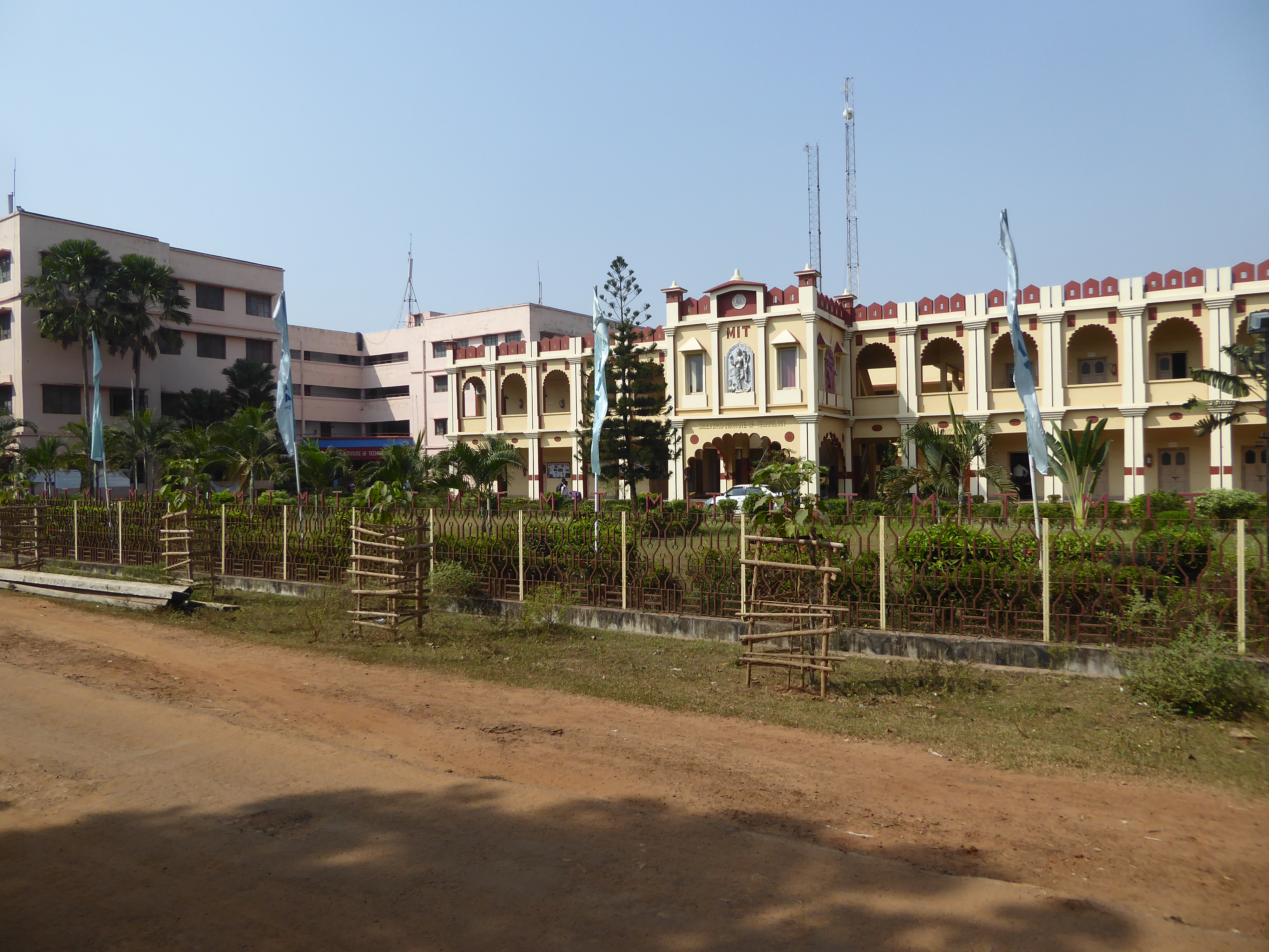 Talk about juxtapositions. Not half a mile from the ferry, there's a school. The initials MIT stand in this case for Mallabhum Institute of