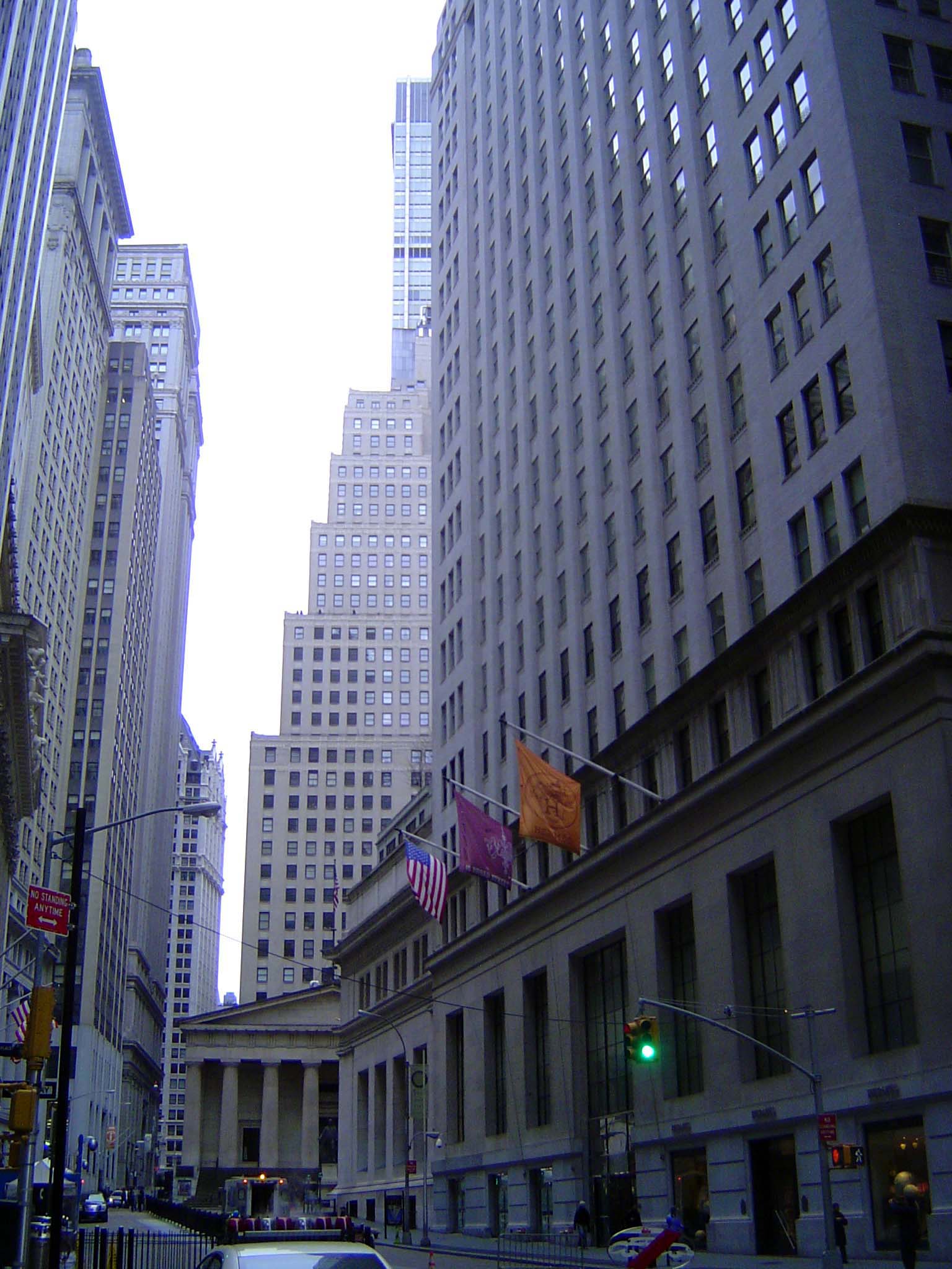 The view down Broad, with the old Chase Manhattan building behind Federal Hall and the stock exchange barely visible to its left. On the rig