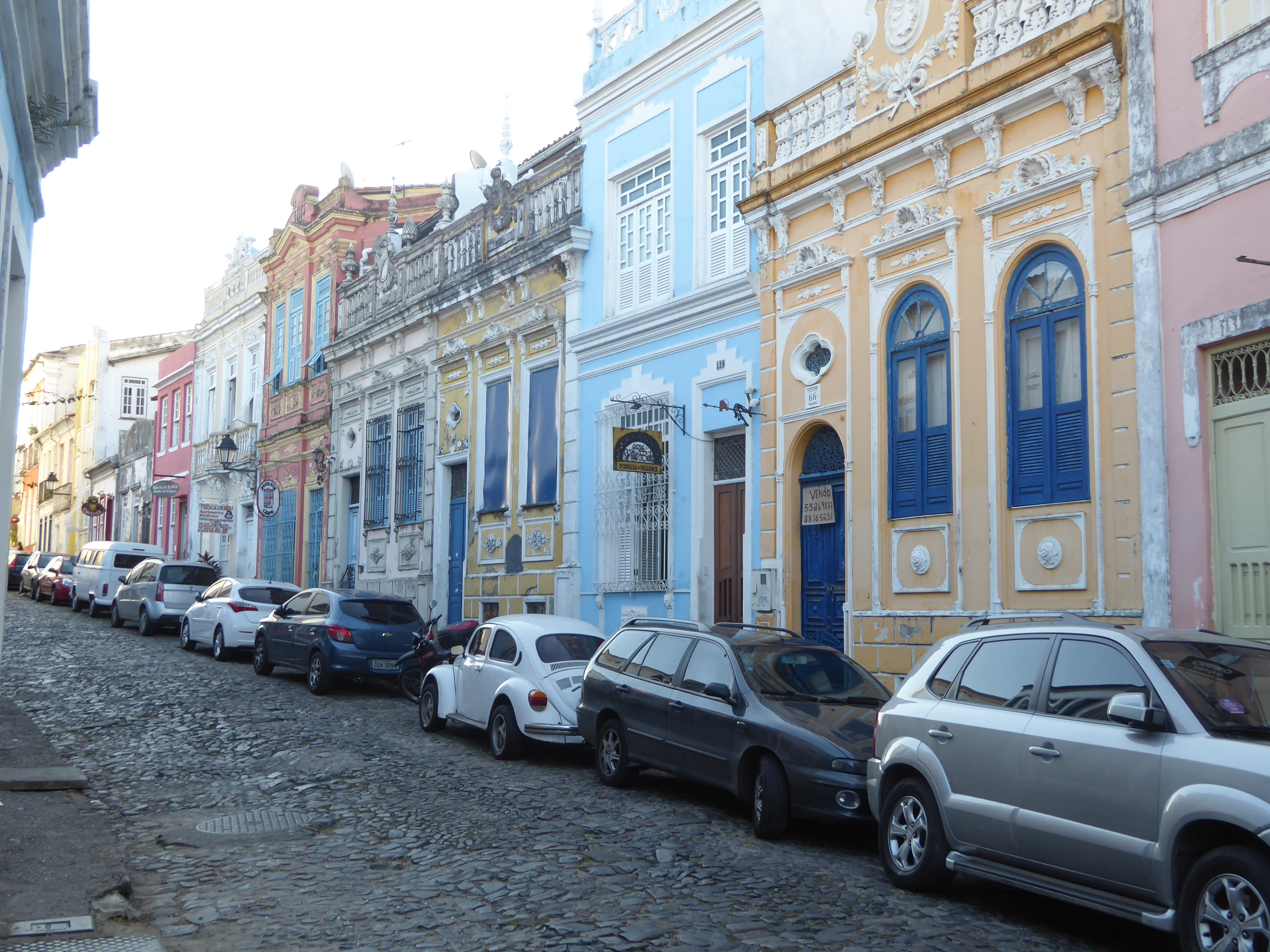 Can't stay cooped up, so we're out on Rua Direita "Straight Street" with a very bookish guide. "The sobrado was a town house of two or more